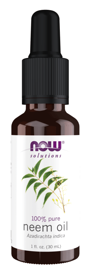 Neem Essential Oil in a dark amber glass dropper bottle with a white label featuring green neem leaves and black dropper cap