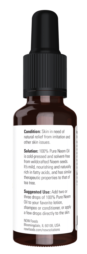 Neem Essential Oil in a brown glass dropper bottle with black cap, showing product label with usage instructions and skin relief benefits
