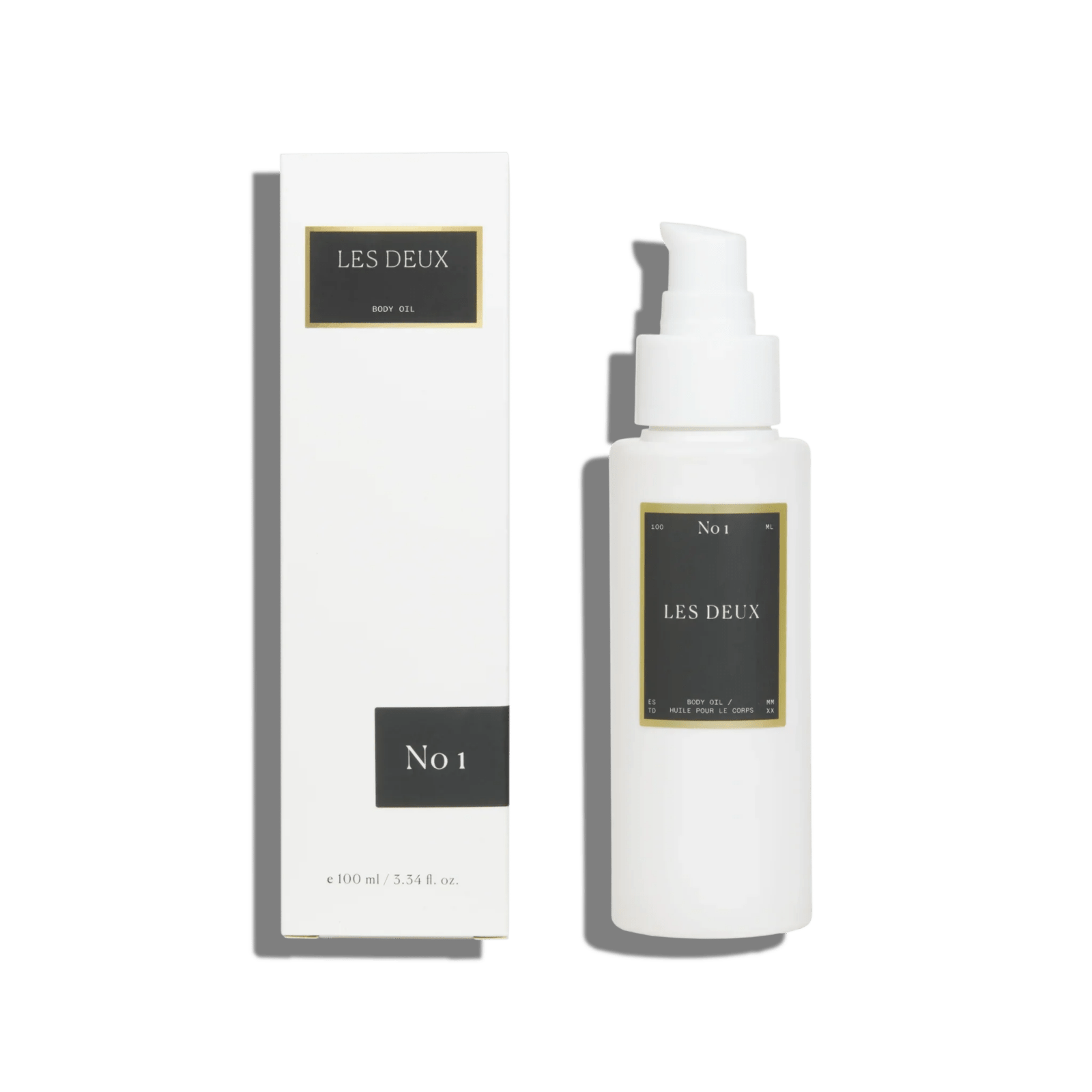 No. 1 - Bois Sacré Body Oil in a white pump bottle with matching box and dark No 1 label
