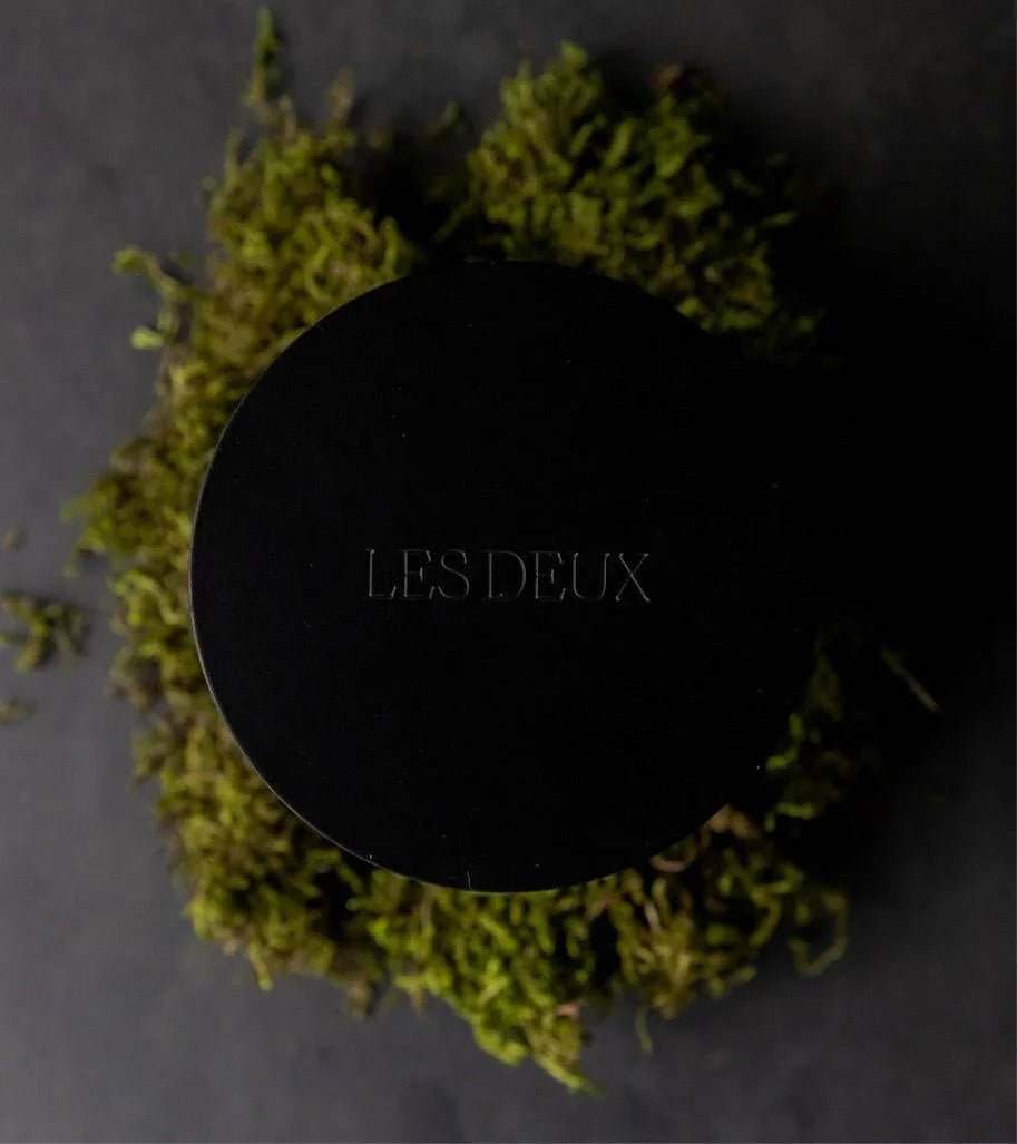 No. 1 - Bois Sacré Candle, matte black container with matching lid and embossed LES DEUX branding