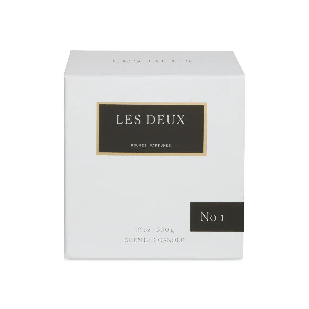 No. 1 - Bois Sacré Candle in a white box with black and gold Les Deux branding, 10 oz scented candle packaging