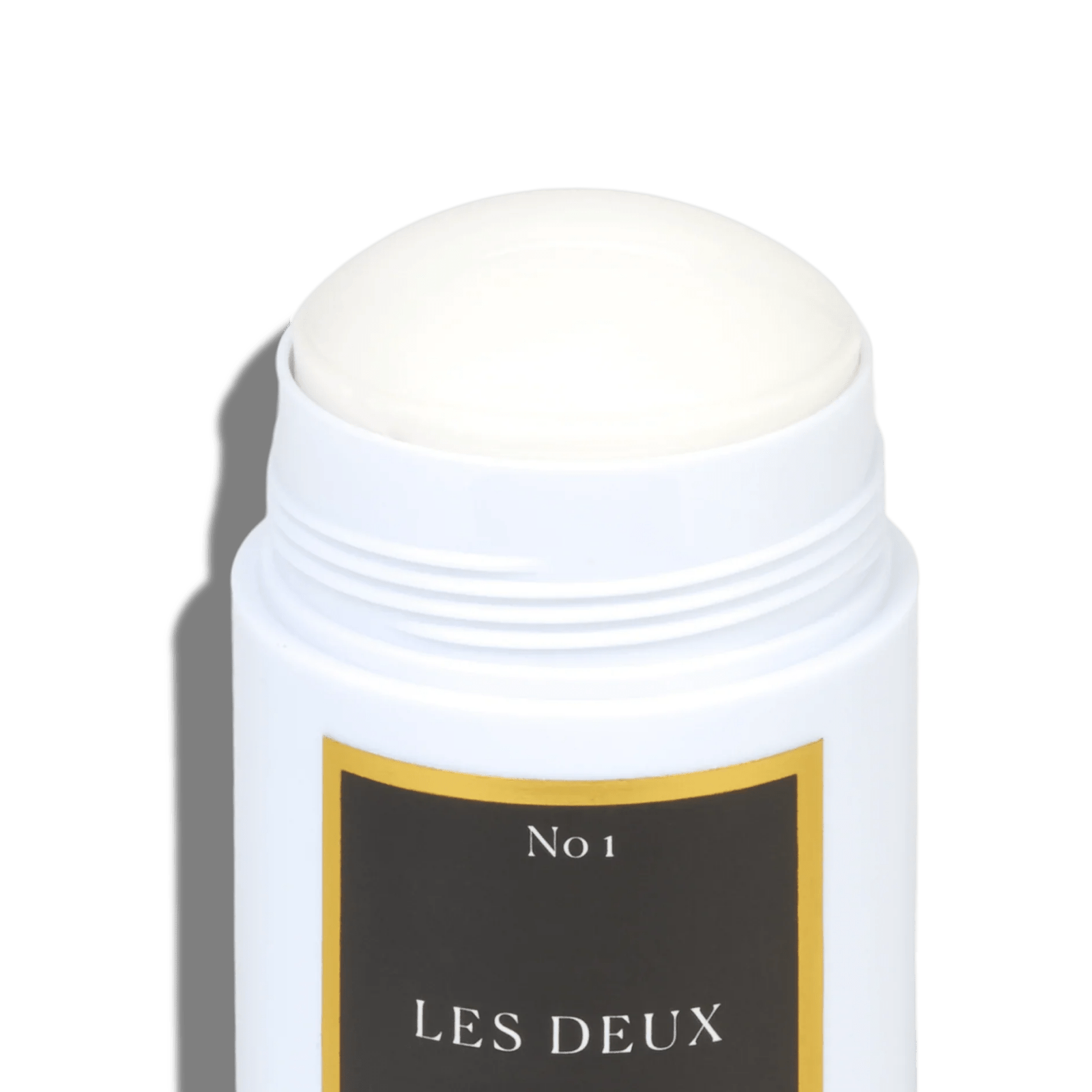 No. 1 - Bois Sacré Deodorant, white plastic roll-on with an open cap and black label framed in gold