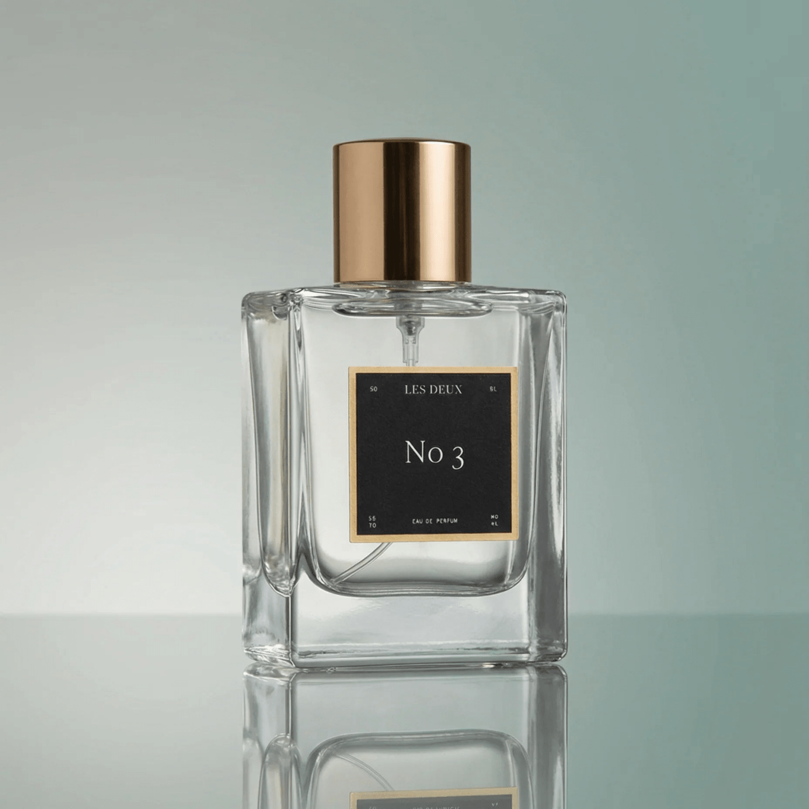 Perfume bottle No. 3 - Brume Ardente Perfume in clear glass with a gold cap and black label