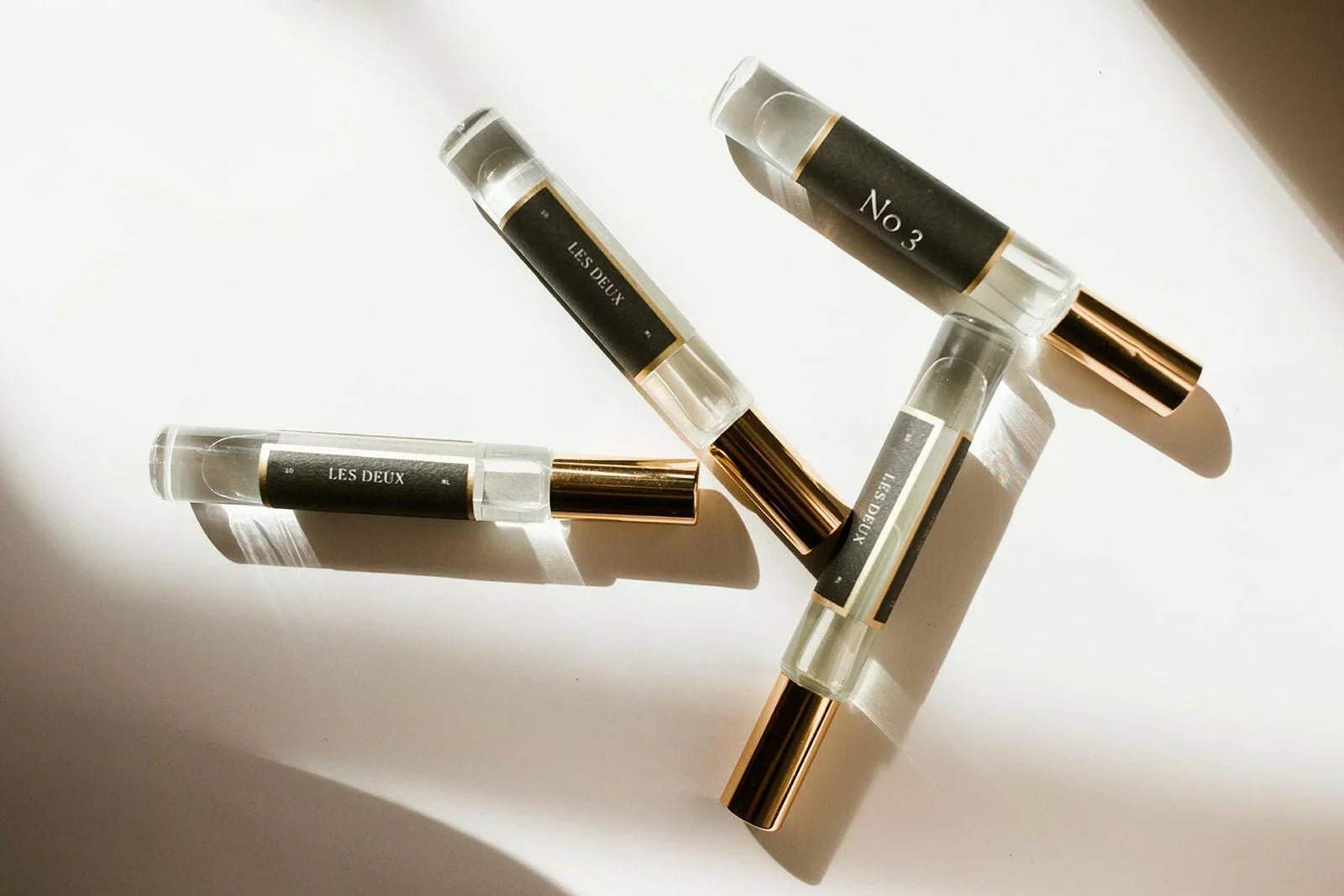 No. 3 - Brume Ardente Roll On Perfume Oil, clear glass vial with black label and gold-tone cap
