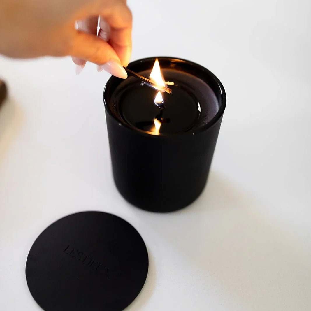 No. 4 - L'Âme Velours Candle, black matte soy wax vessel with lit wick and matching metal lid
