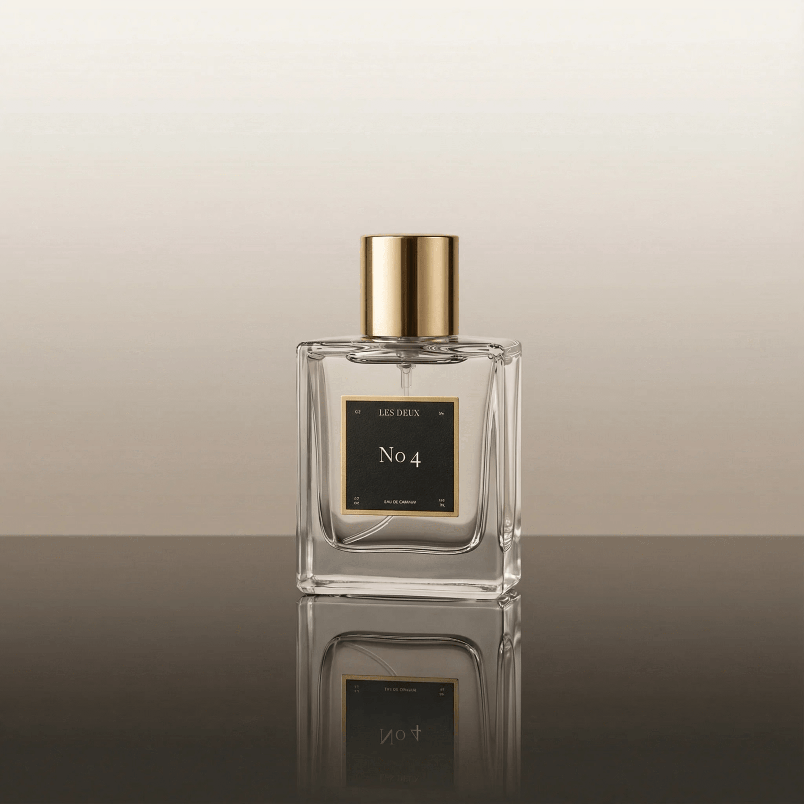 Perfume bottle, clear glass with gold cap and black No 4 label, featuring a rectangular fluted design—No. 4 - L'Âme Velours Perfume
