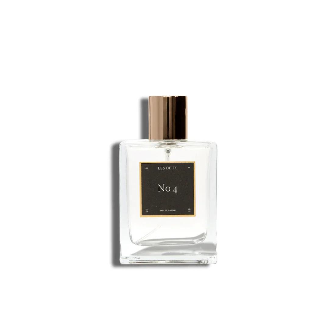 No. 4 - L'Âme Velours Perfume in a clear glass bottle with a metallic gold cap and black label
