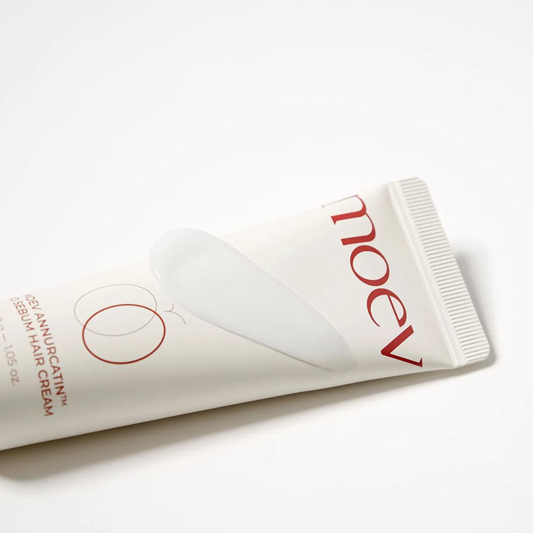 No Sebum Hair Cream in a white tube with red text and a minimalistic red circular design, featuring a smooth white creamy texture.