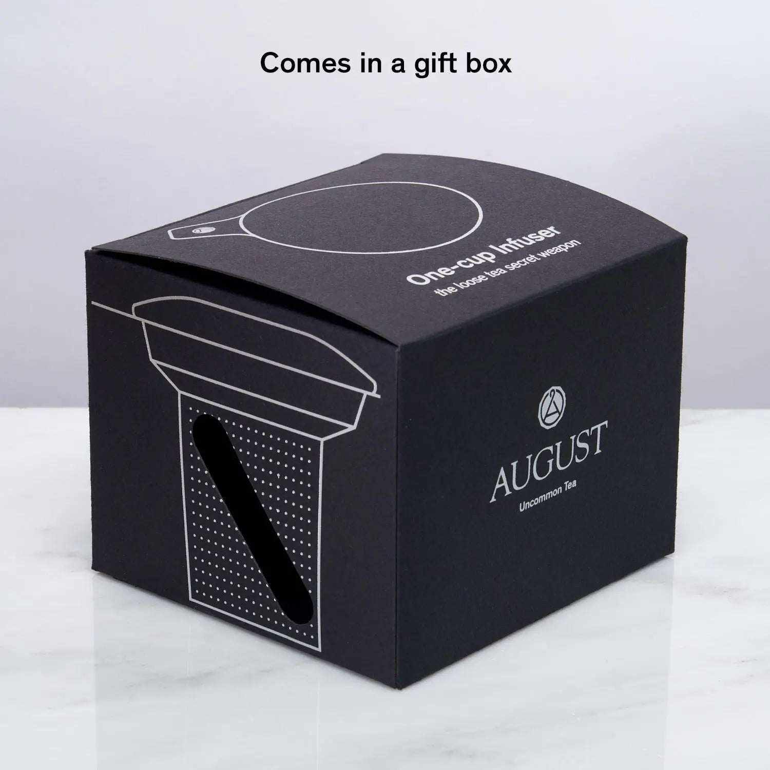 One Cup Infuser gift box in black, featuring white line art of a mug infuser and August branding
