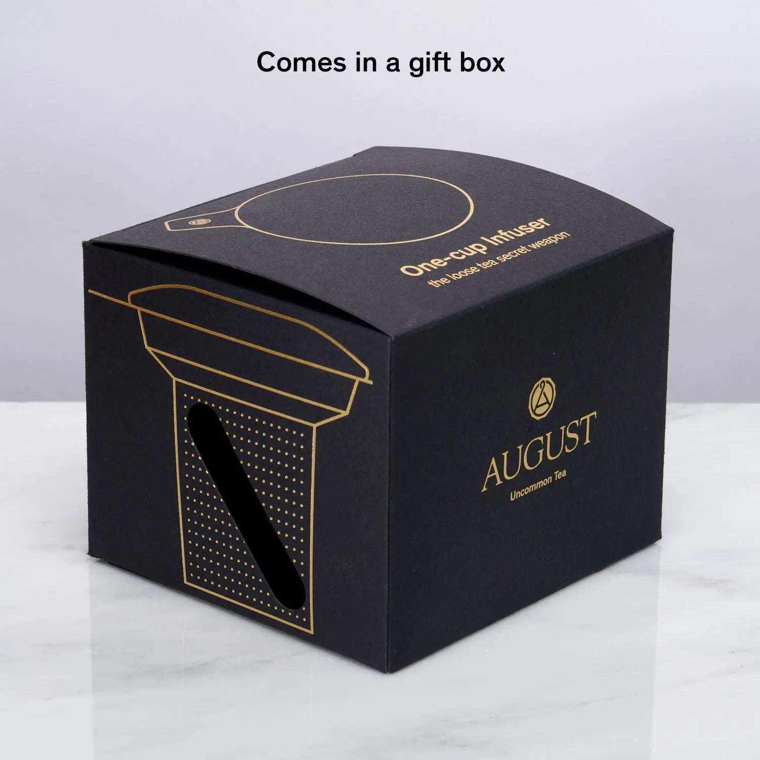One Cup Infuser gift box in black with gold printed infuser illustration, August branding, and matching gold lettering