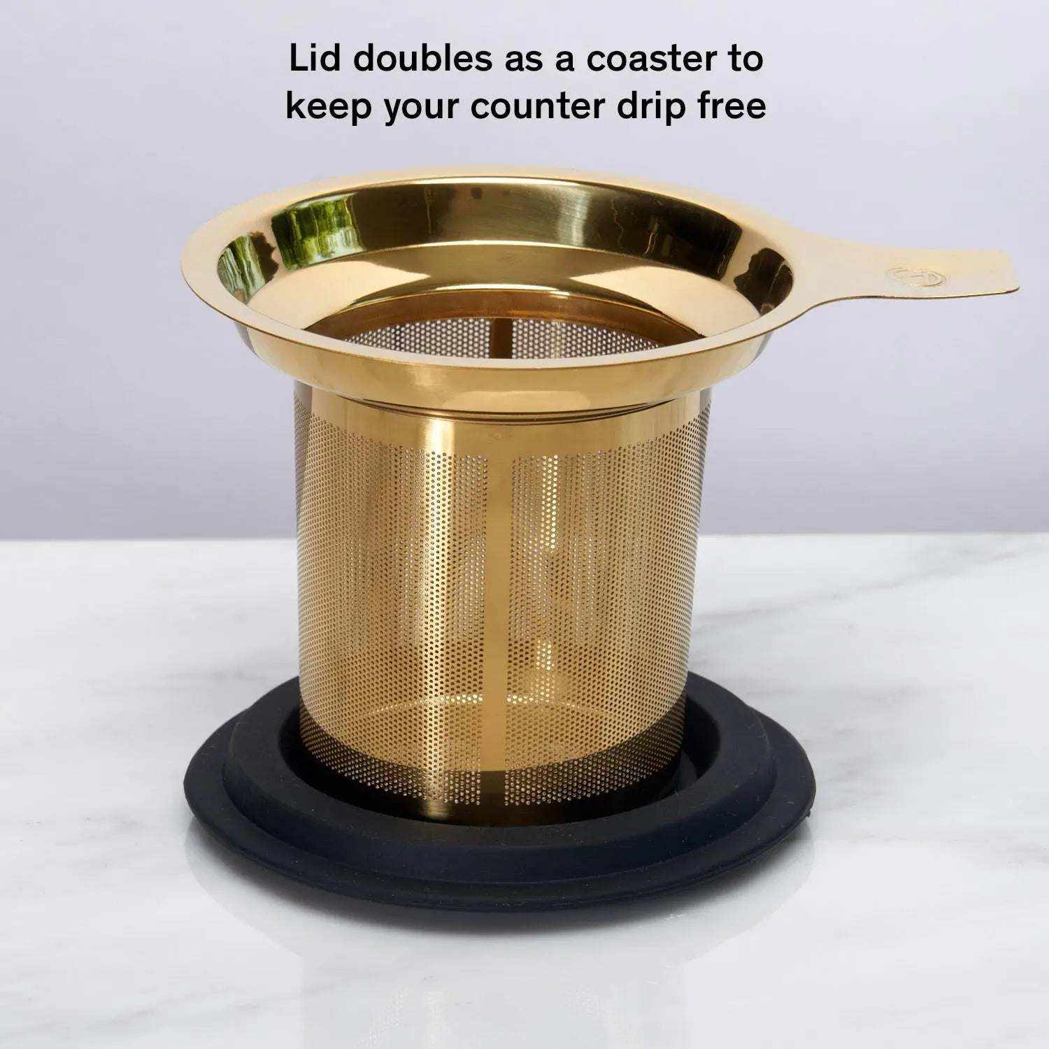 One Cup Infuser in gold-tone stainless steel with fine mesh and black silicone coaster lid