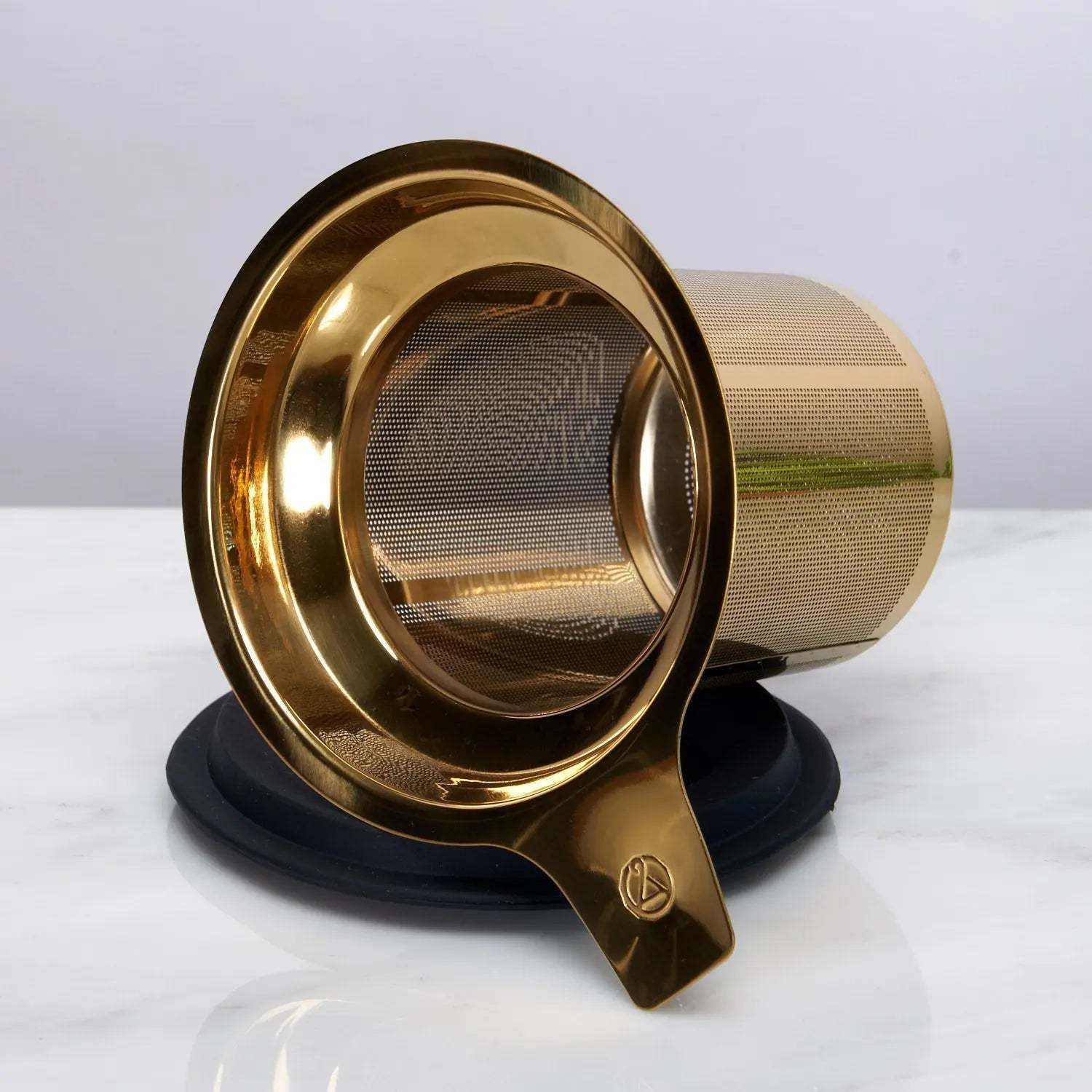 One Cup Infuser in gold-toned stainless steel with fine mesh filter and black silicone lid