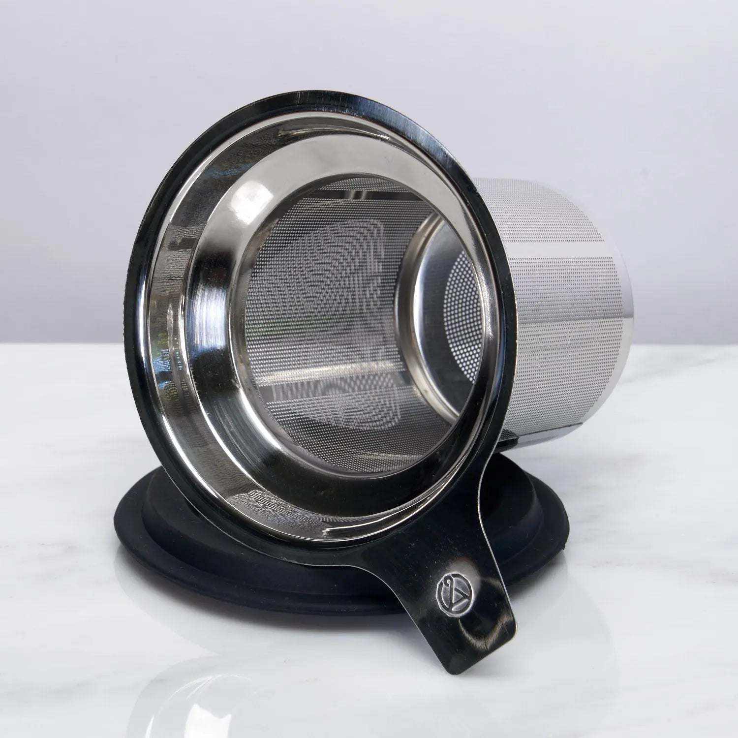 One Cup Infuser in stainless steel with fine micro mesh, black silicone rim, base and handle