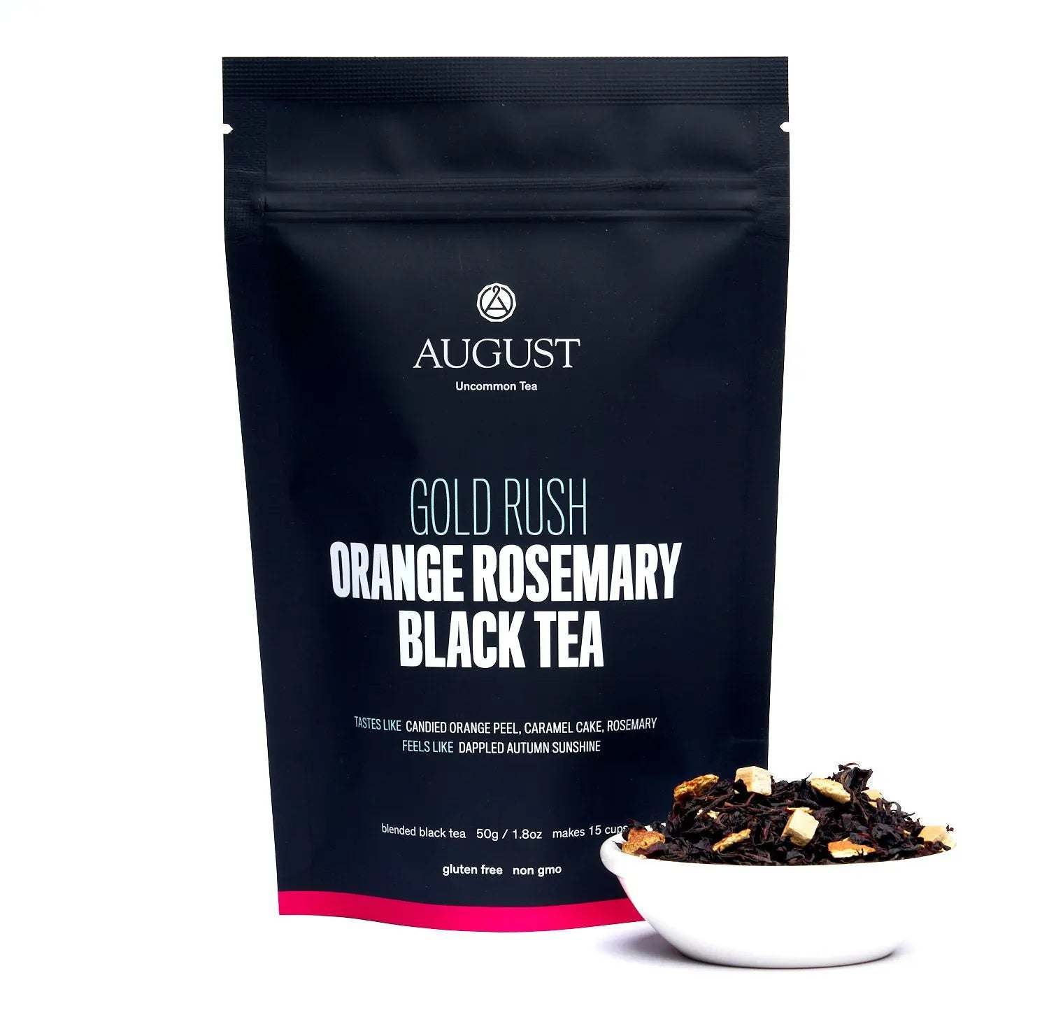 Orange Rosemary Caramel Black Tea in a dark resealable pouch with loose black tea and orange peel in a white bowl