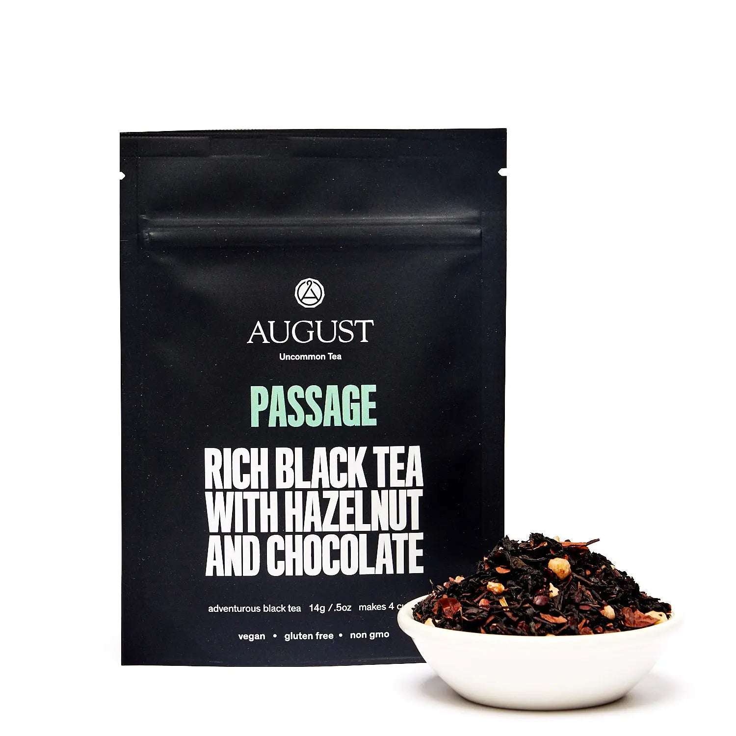 Passage - Hazelnut Chocolate Black Tea in black packaging, with a white bowl of loose black tea and visible hazelnut pieces