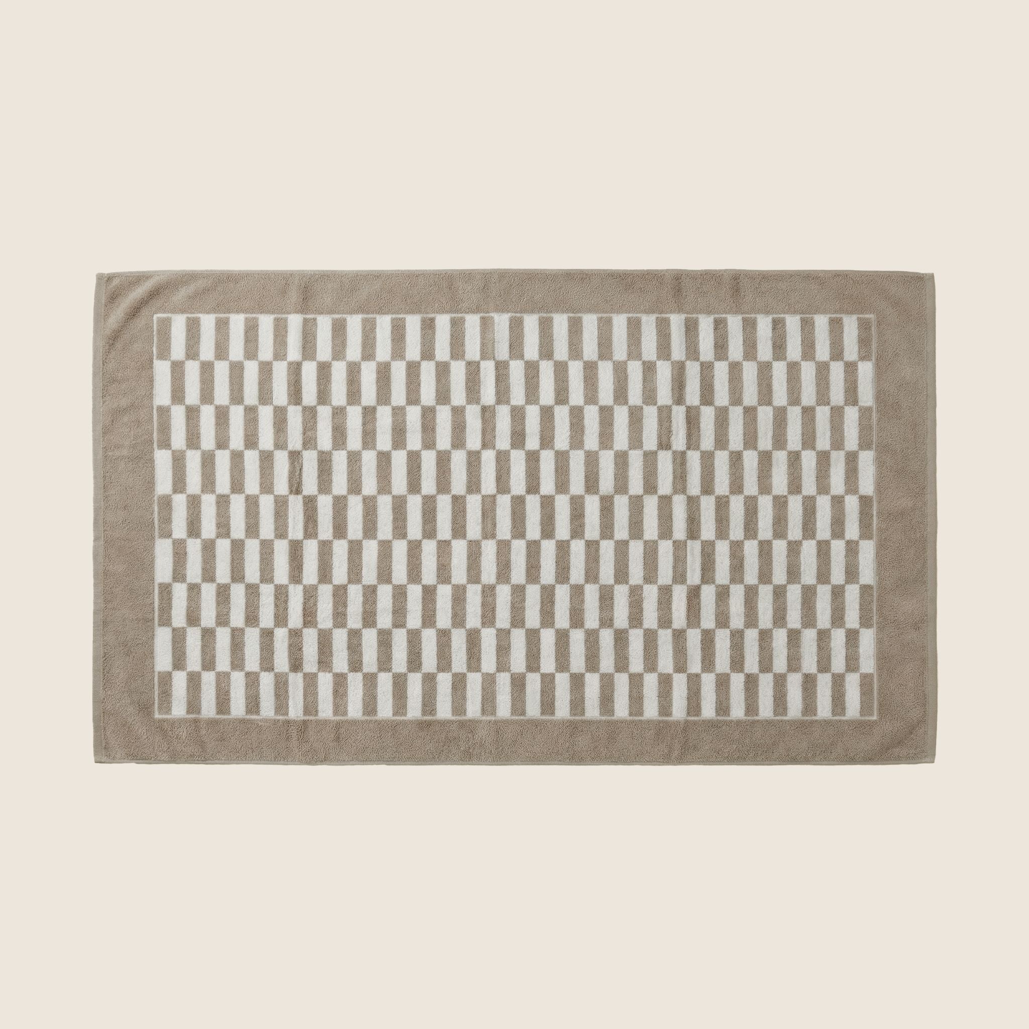 Pietra Australian Cotton towels with bold warped-checkered design