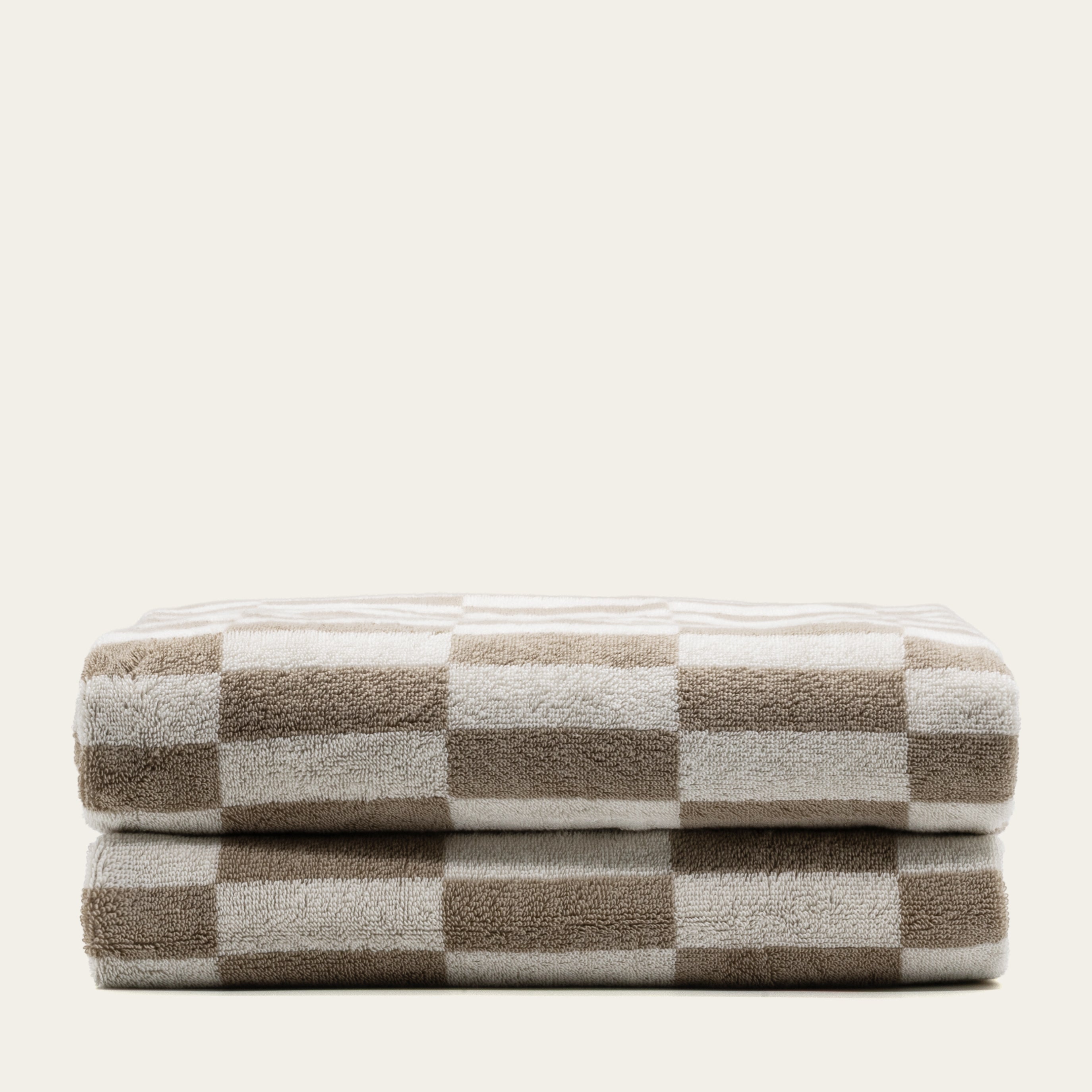 Pietra Australian Cotton towels with warped-checkered design