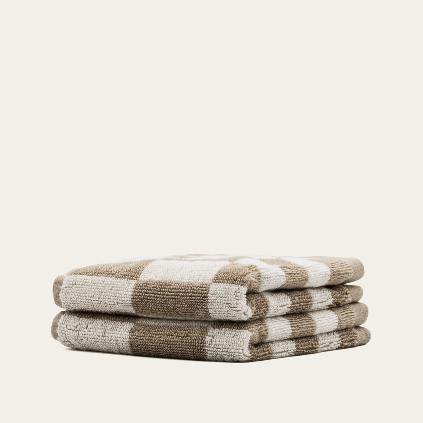 Pietra Australian Cotton towels set with warped-checkered design