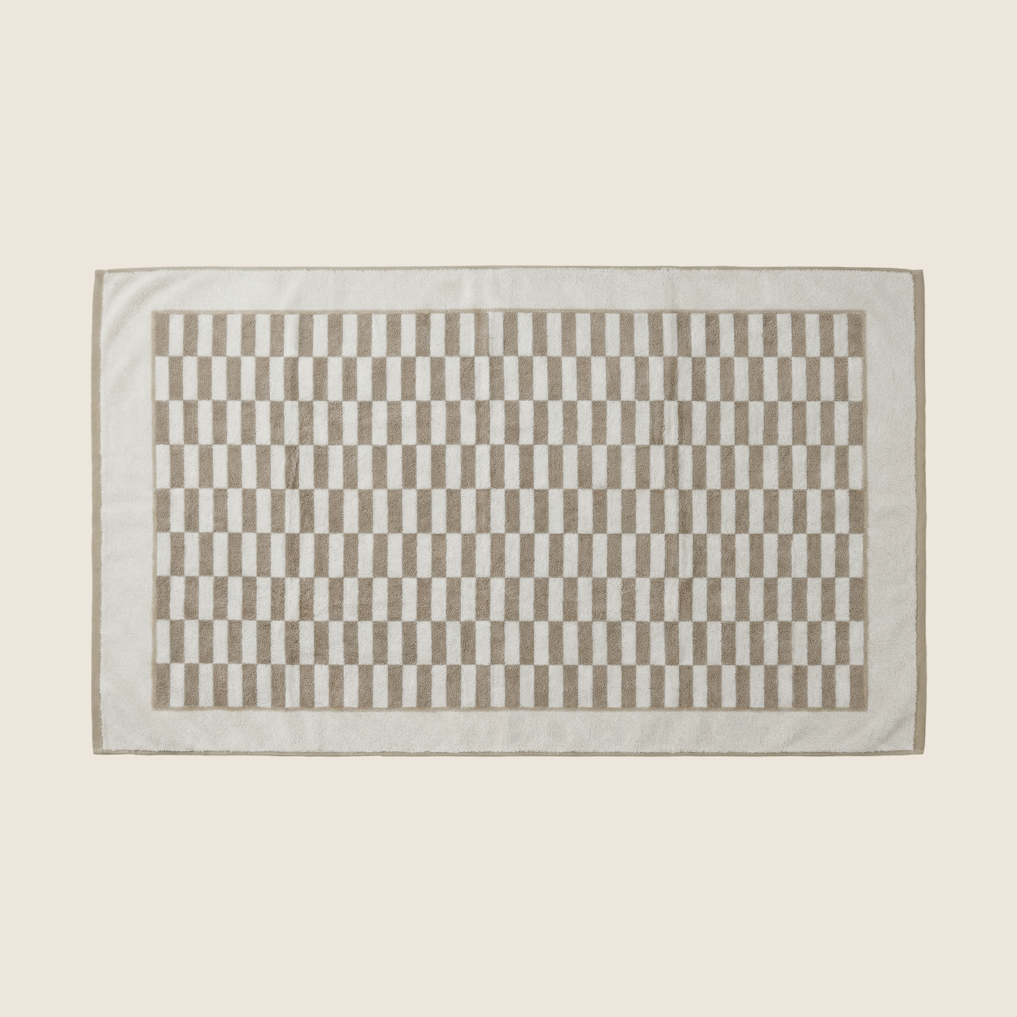 Pietra Australian Cotton towels with warped-checkered design