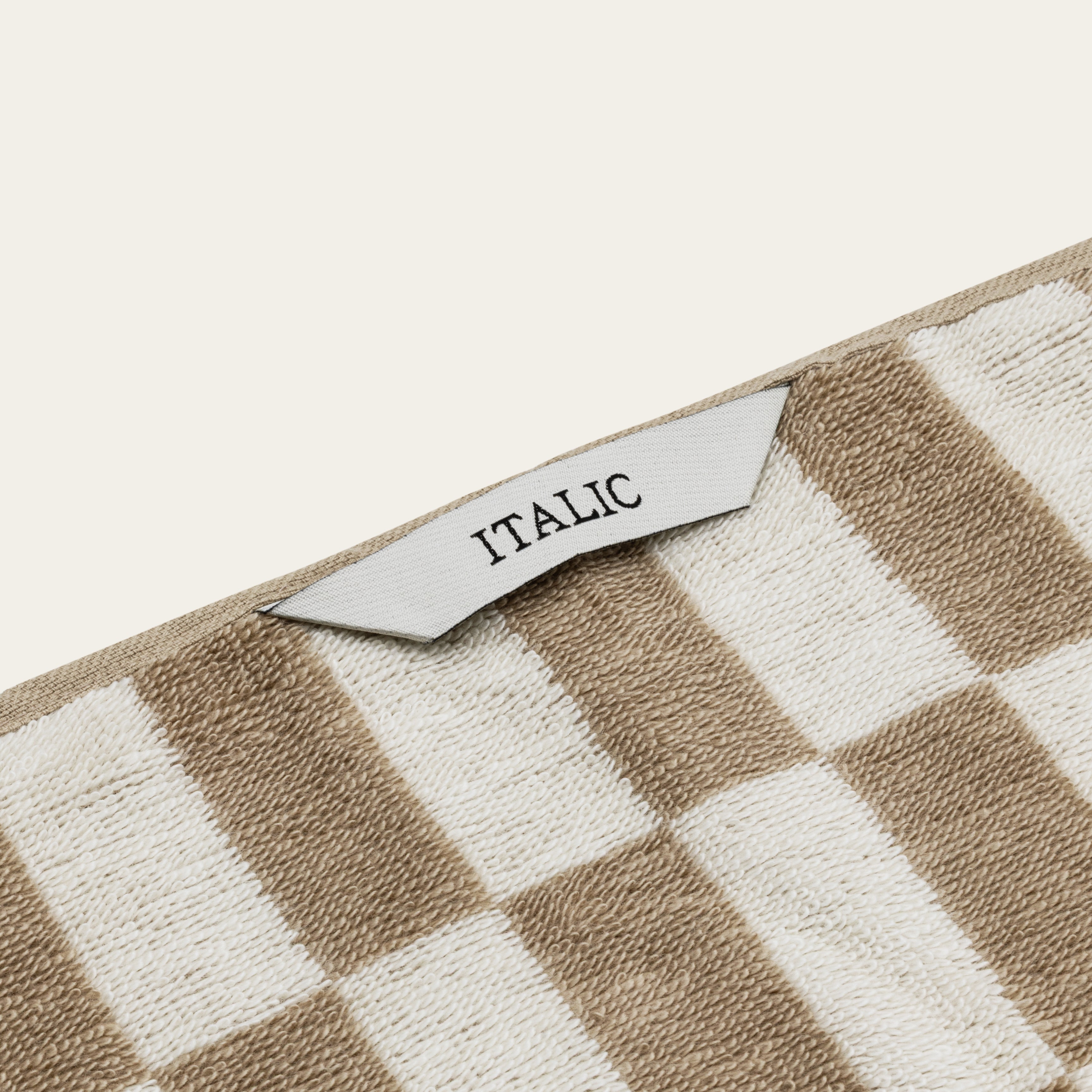 Pietra Australian Cotton towels with warped-checkered design