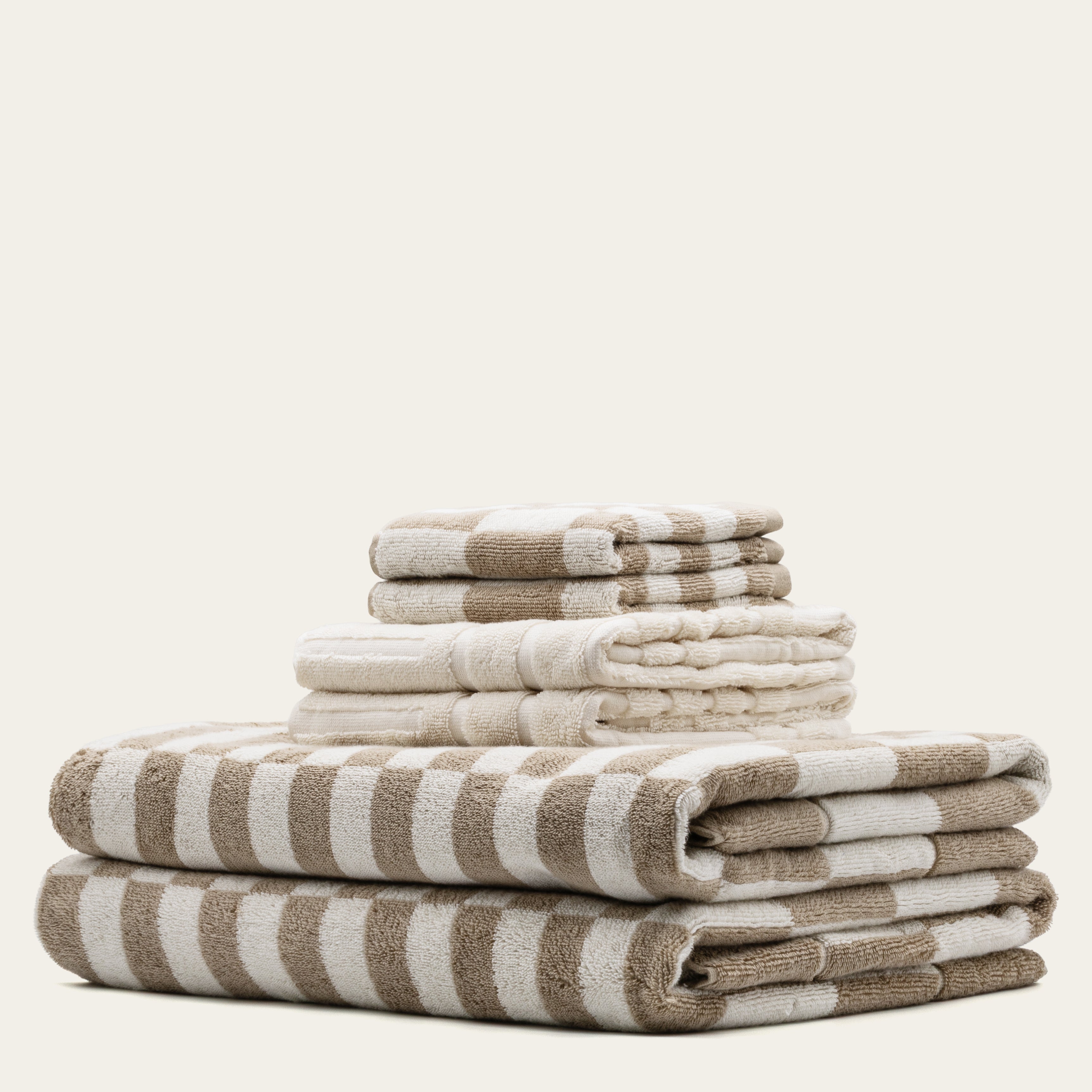 Pietra Australian Cotton towels with warped-checkered design