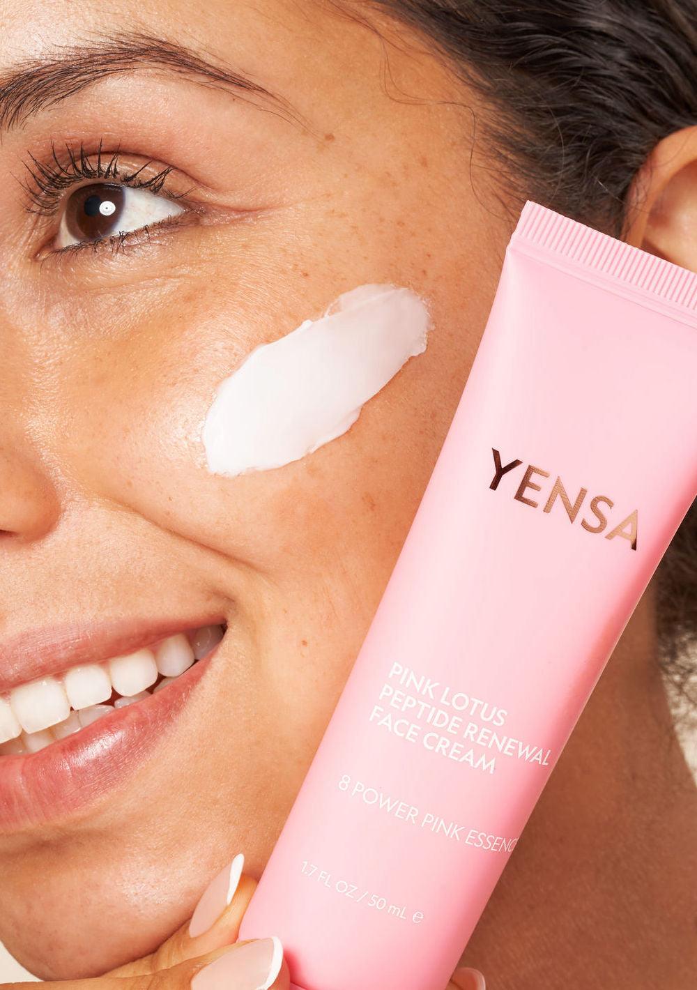 Jar of Pink Lotus Peptide Renewal Face Cream with pink lotus flower