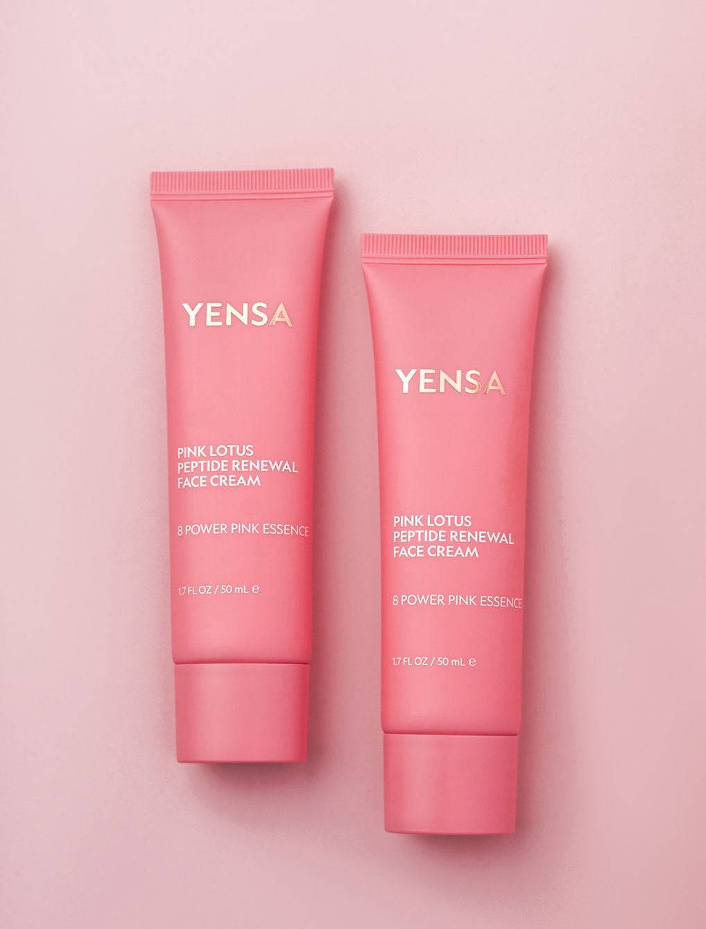 Pink lotus peptide renewal face cream jar with lotus flower