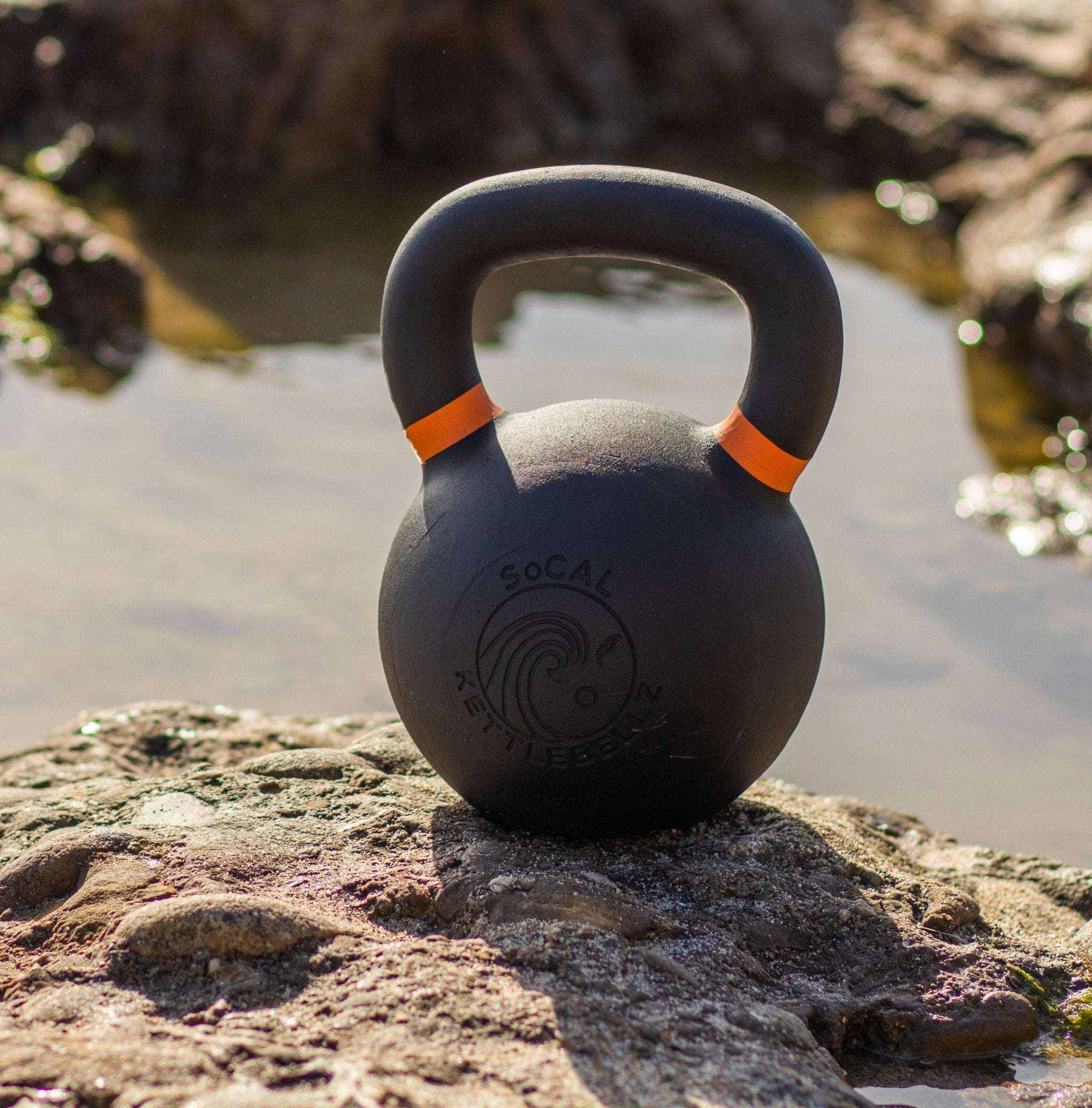 Powder coated kettlebell with textured grip and color weight indicators