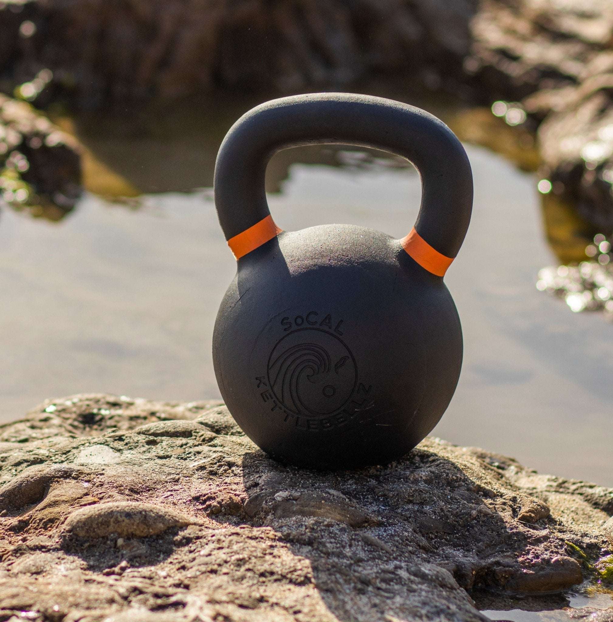 Powder coated kettlebell with textured grip and color weight indicators