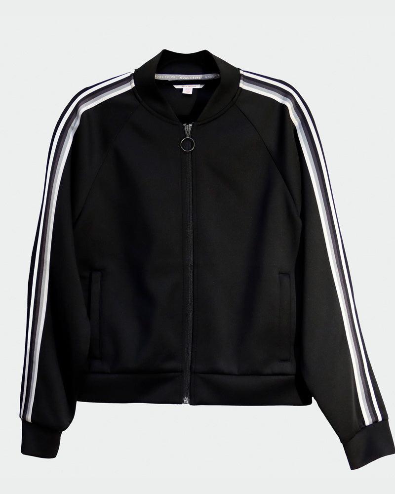 Powerstripe LS Track Jacket in black with white and lavender sleeve stripes, smooth fabric, zip front and ribbed cuffs