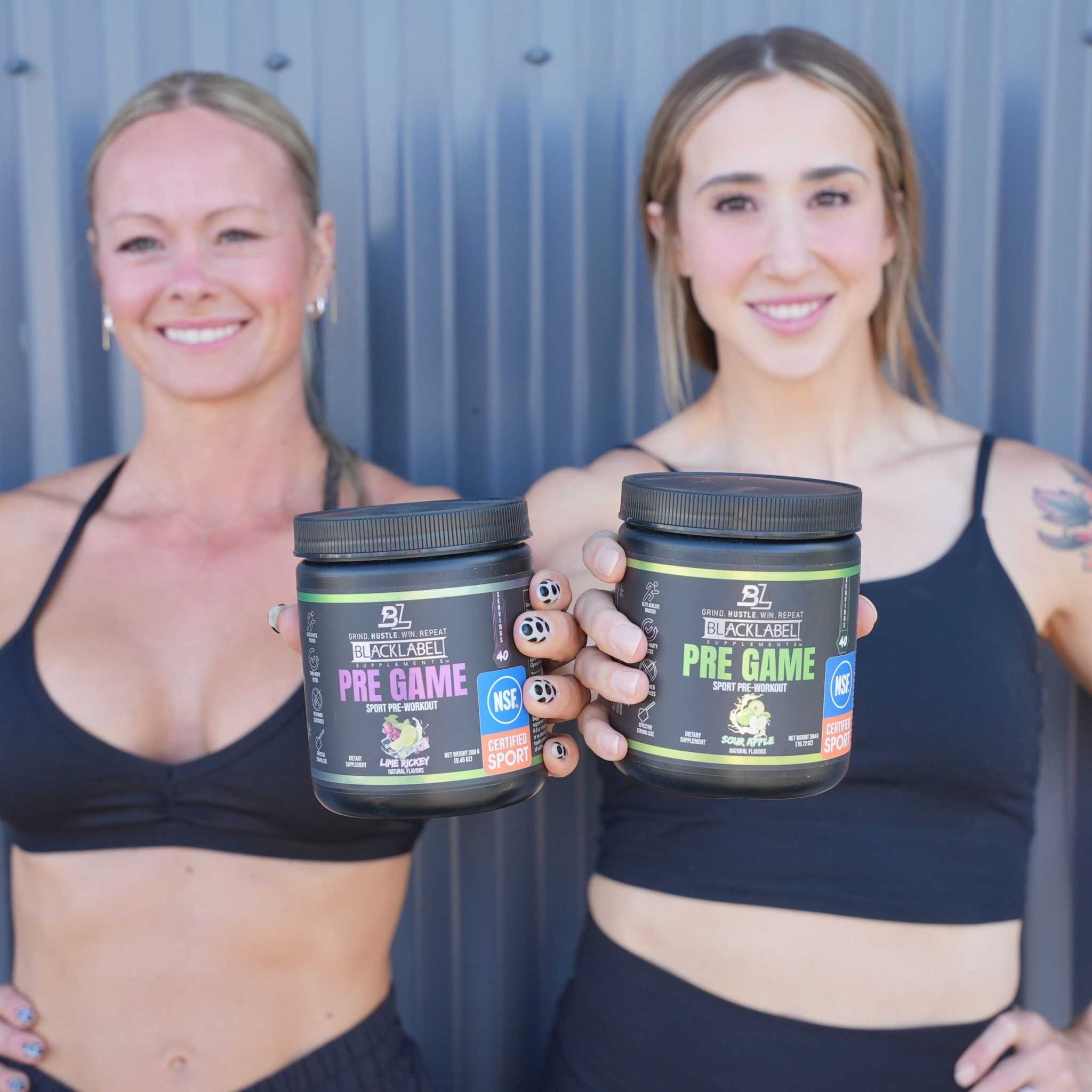 PRE GAME powdered supplement tubs in black containers with purple and green labels, black lids and NSF Certified for Sport badges