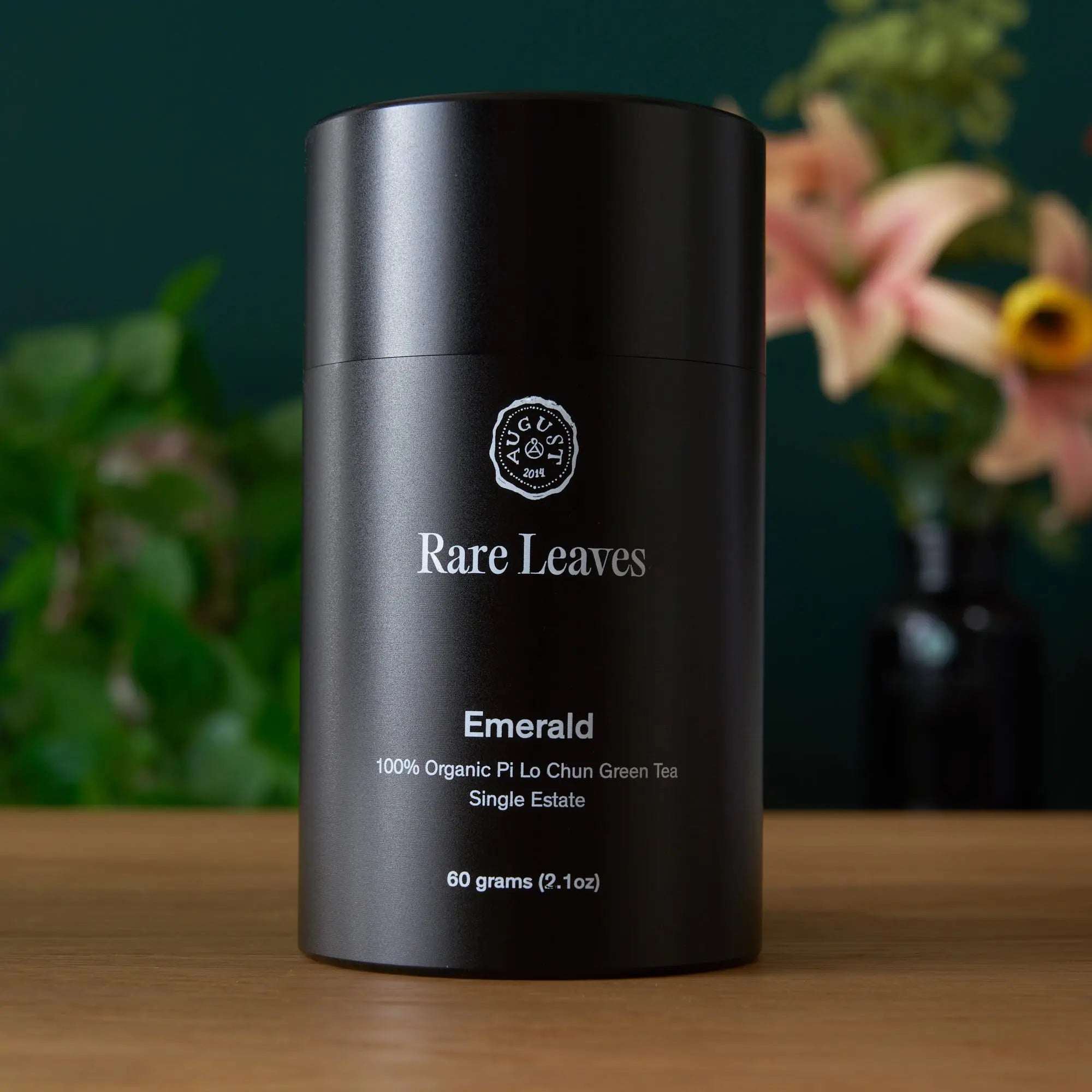 Premium Loose Leaf Tea Emerald Rare Leaves tin, matte black aluminum with white lettering and cylindrical design
