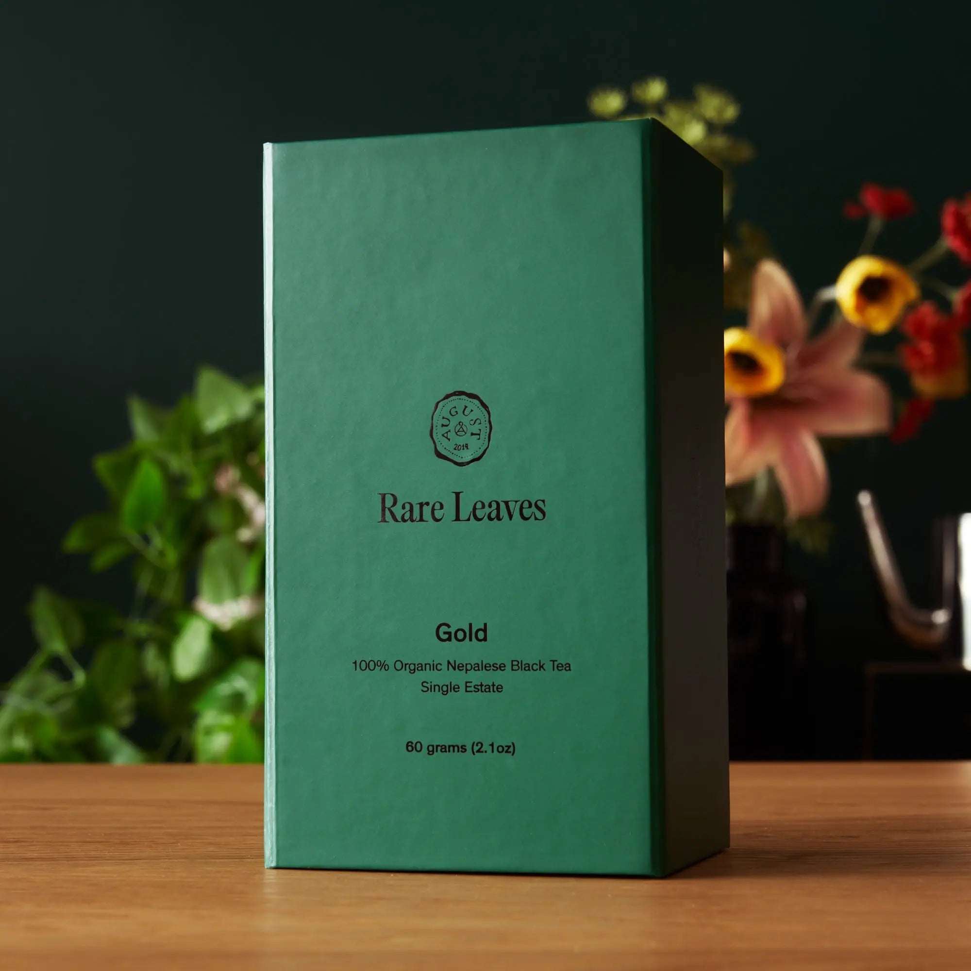 Premium Loose Leaf Tea gift box, green paper packaging with Gold Rare Leaves Nepalese black tea label
