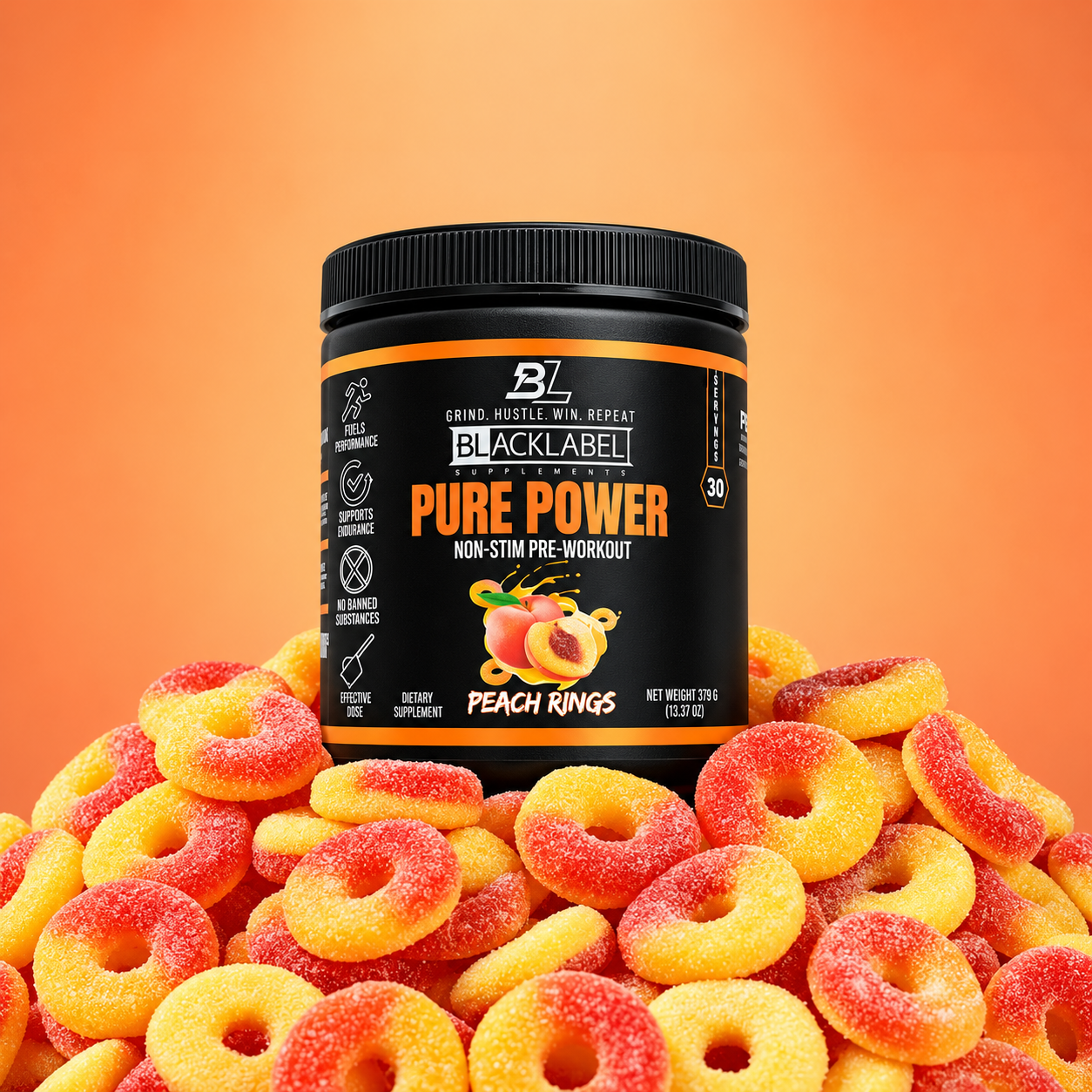 PURE POWER pre-workout supplement in a black tub with orange label, peach rings flavour and peach imagery