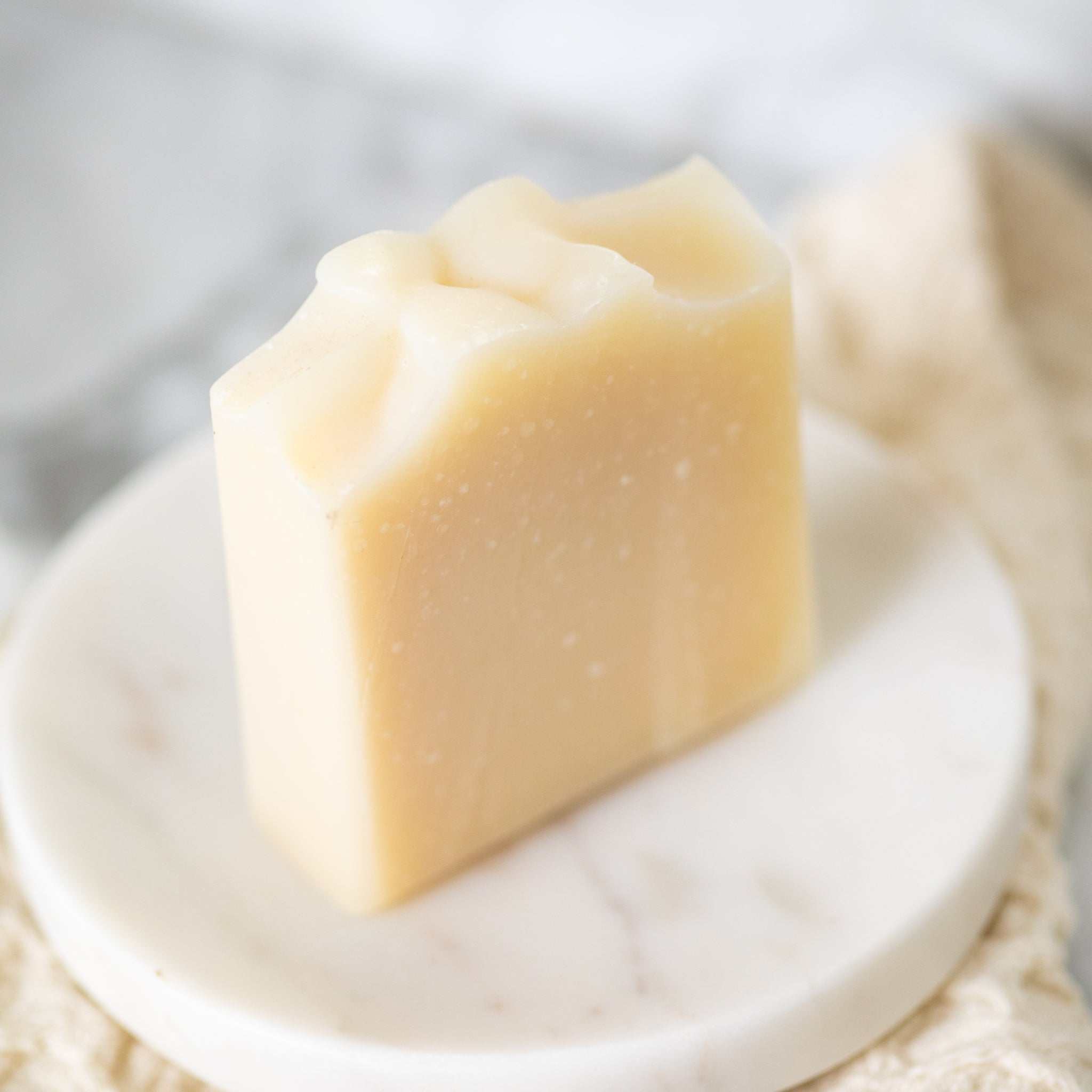 Pure + Simple Skin Kit goat milk soap bar, creamy ivory with a smooth hand-cut finish
