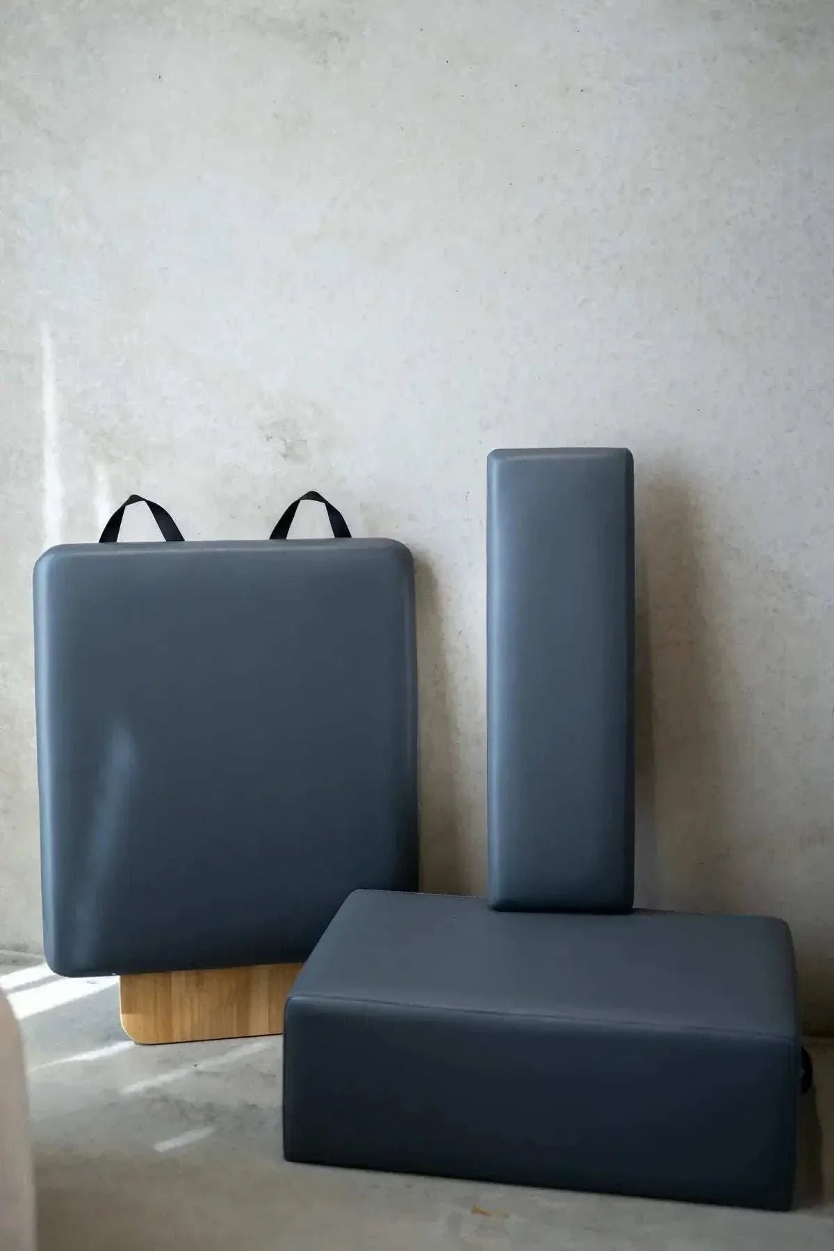 Queen Studio Pilates Reformer gray padded foam cushions in various ergonomic shapes for studio or home use, durable and comfortable design.