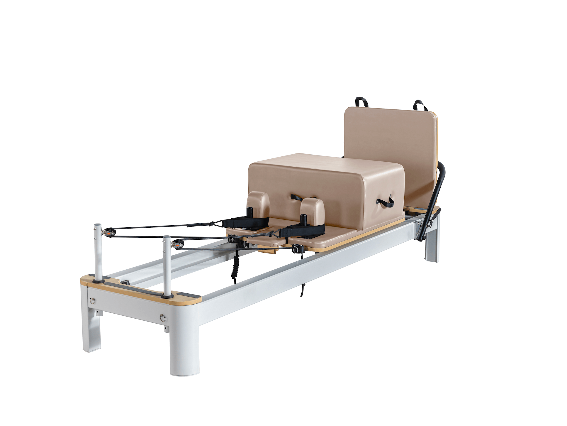 Queen Studio Reformer Pilates machine in beige padded cushions and silver metal frame with black straps and wooden accents