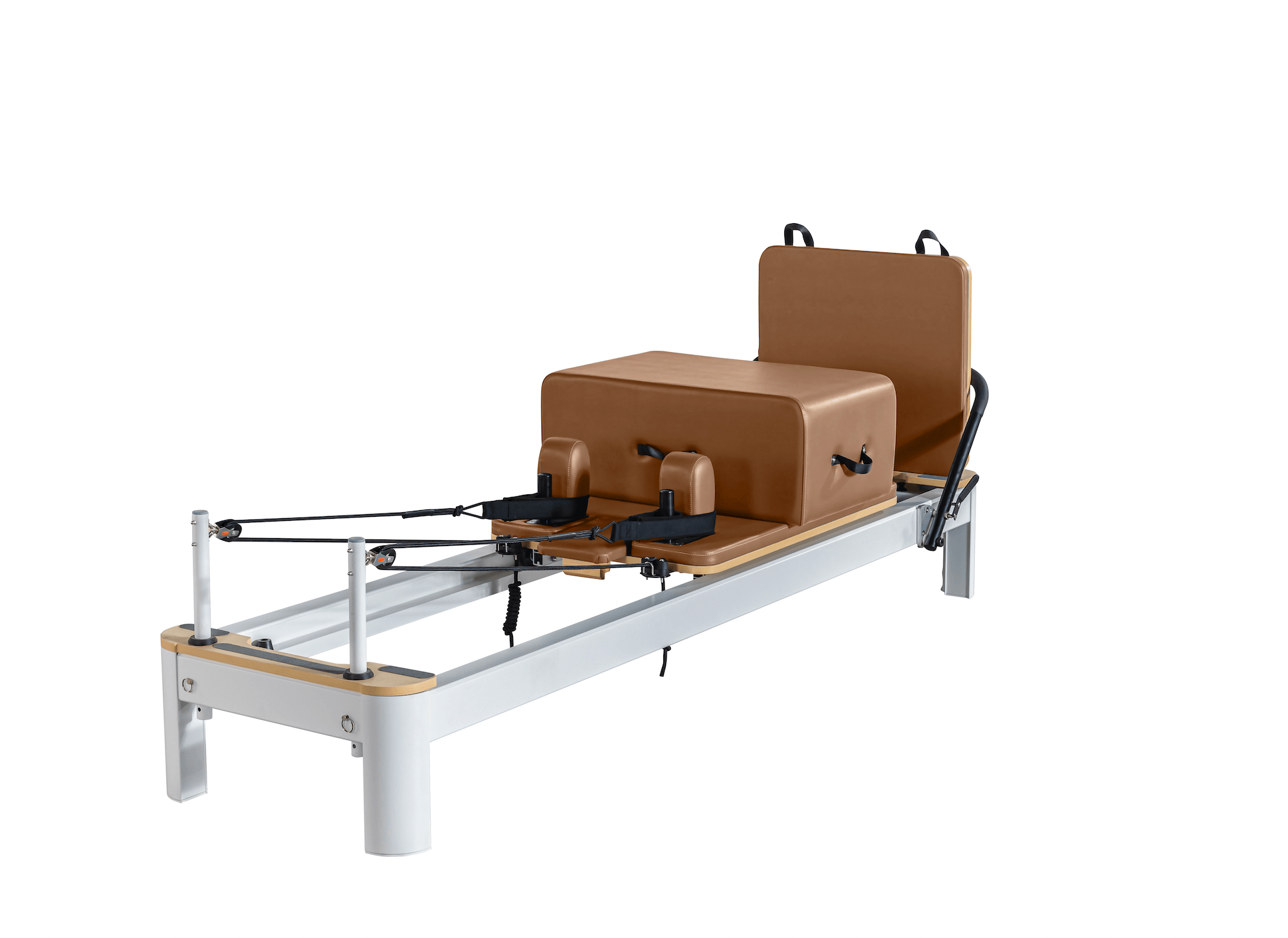 Queen Studio Reformer with silver metal frame and brown padded leather carriage, box, and headrest for Pilates workouts