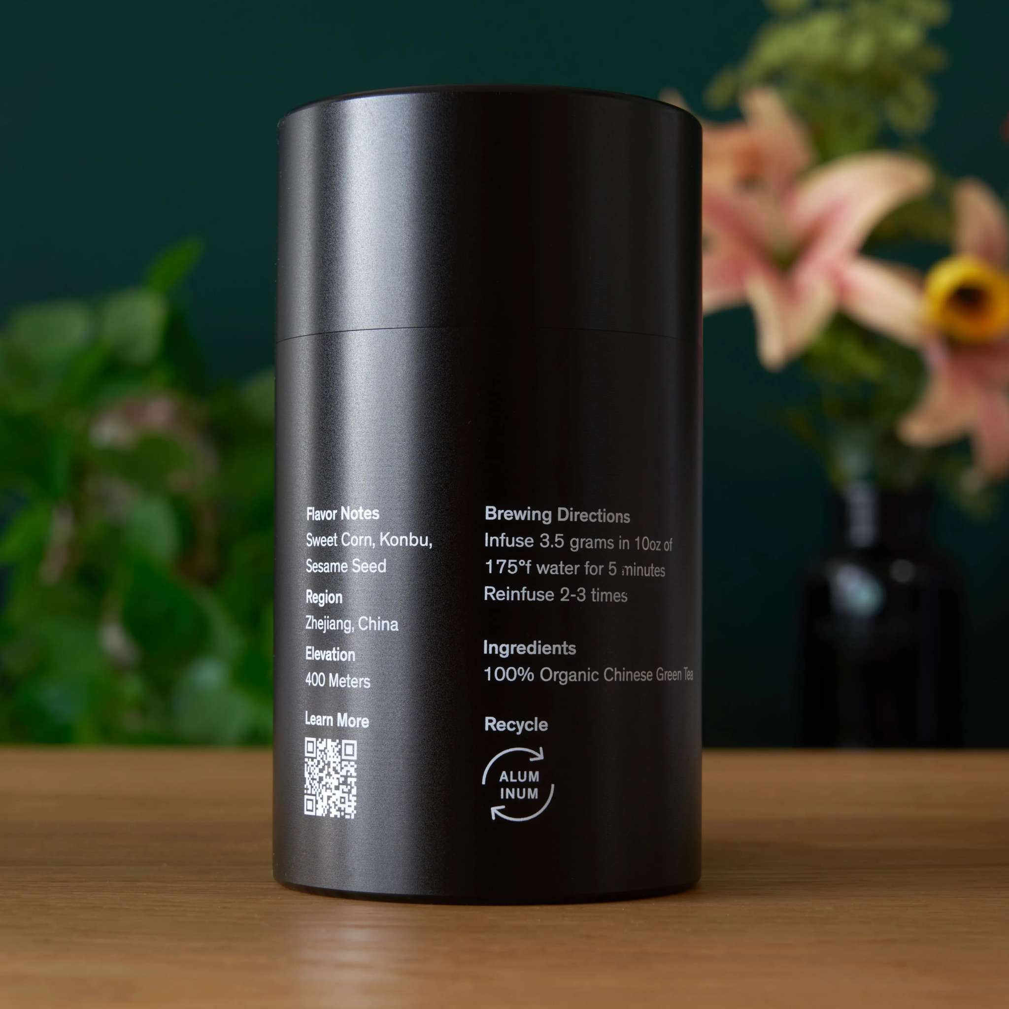 Rare Leaves Emerald - Pi Lo Chun Green Tea in a sleek black aluminum tin with printed brewing and ingredient details