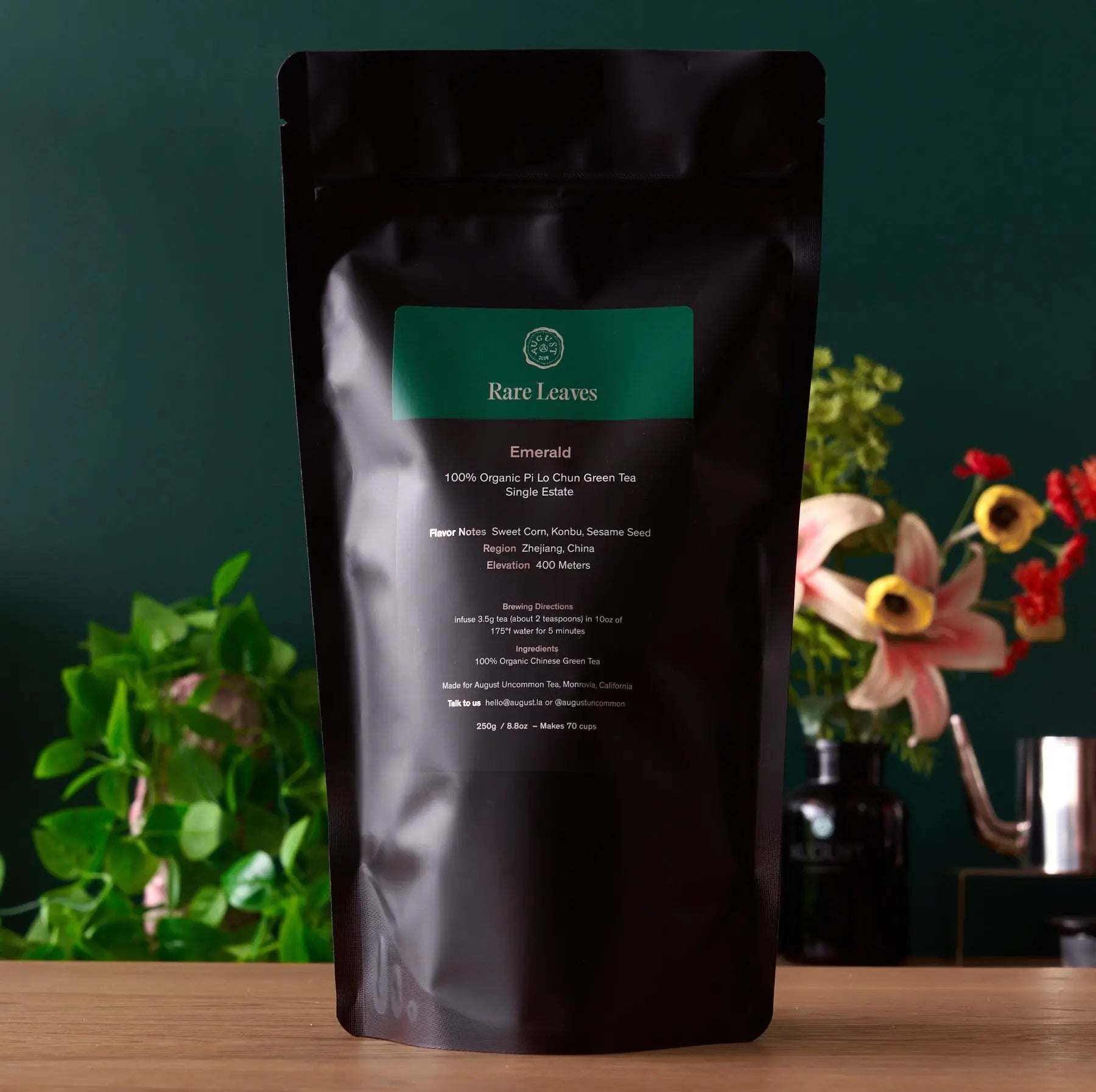 Rare Leaves Emerald - Pi Lo Chun Green Tea in a black resealable pouch with emerald green label