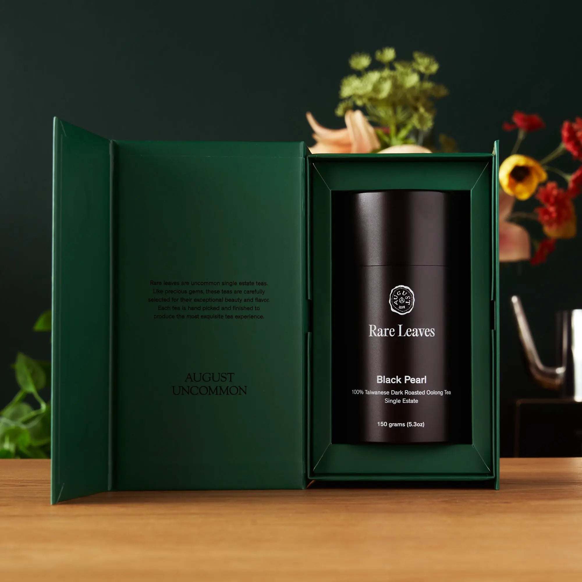 Rare Leaves - Single Estate Taiwanese Dark Oolong Tea in a black tin with green gift box packaging
