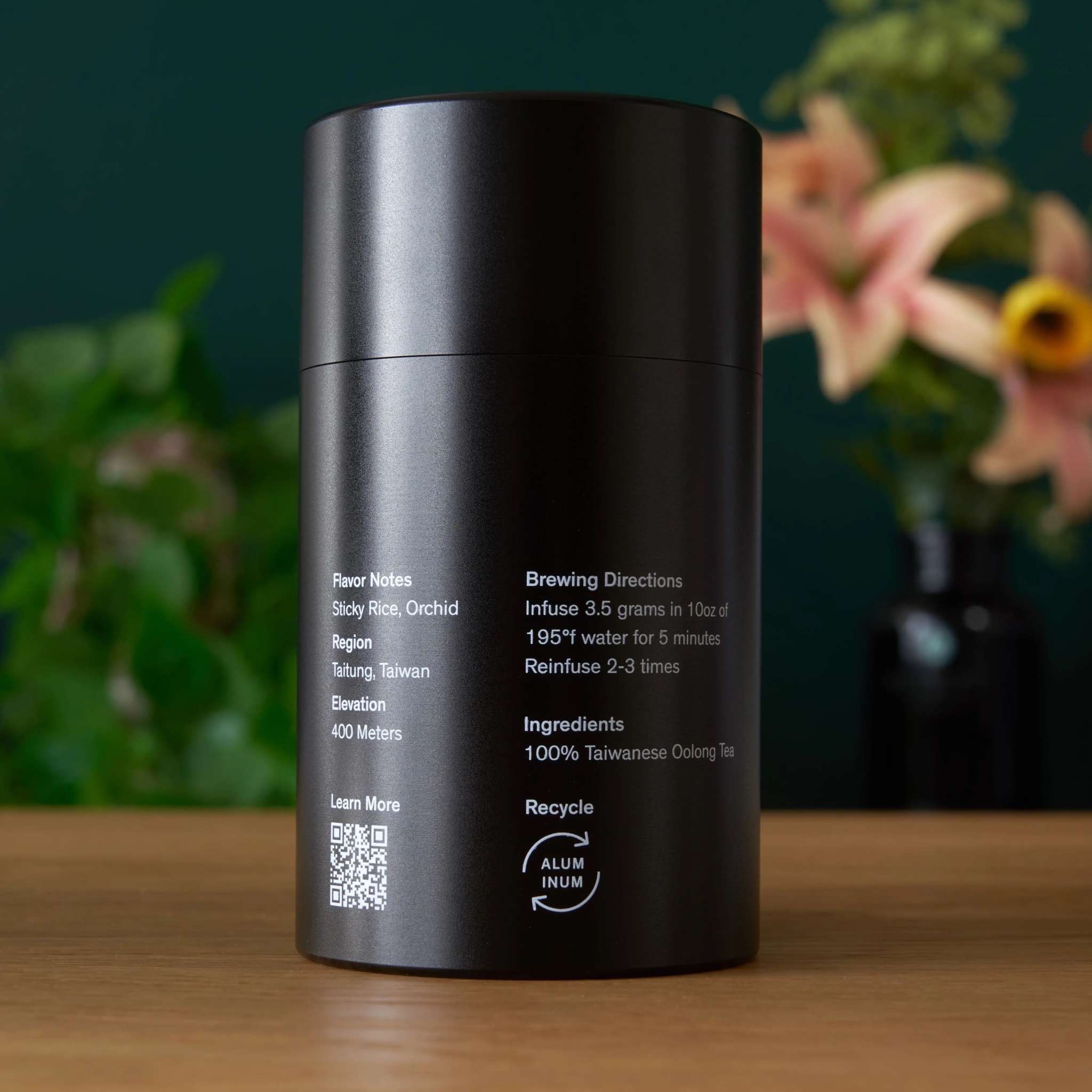 Rare Leaves - Single Estate Taiwanese Dark Oolong Tea in a black aluminum cylindrical tin with white text
