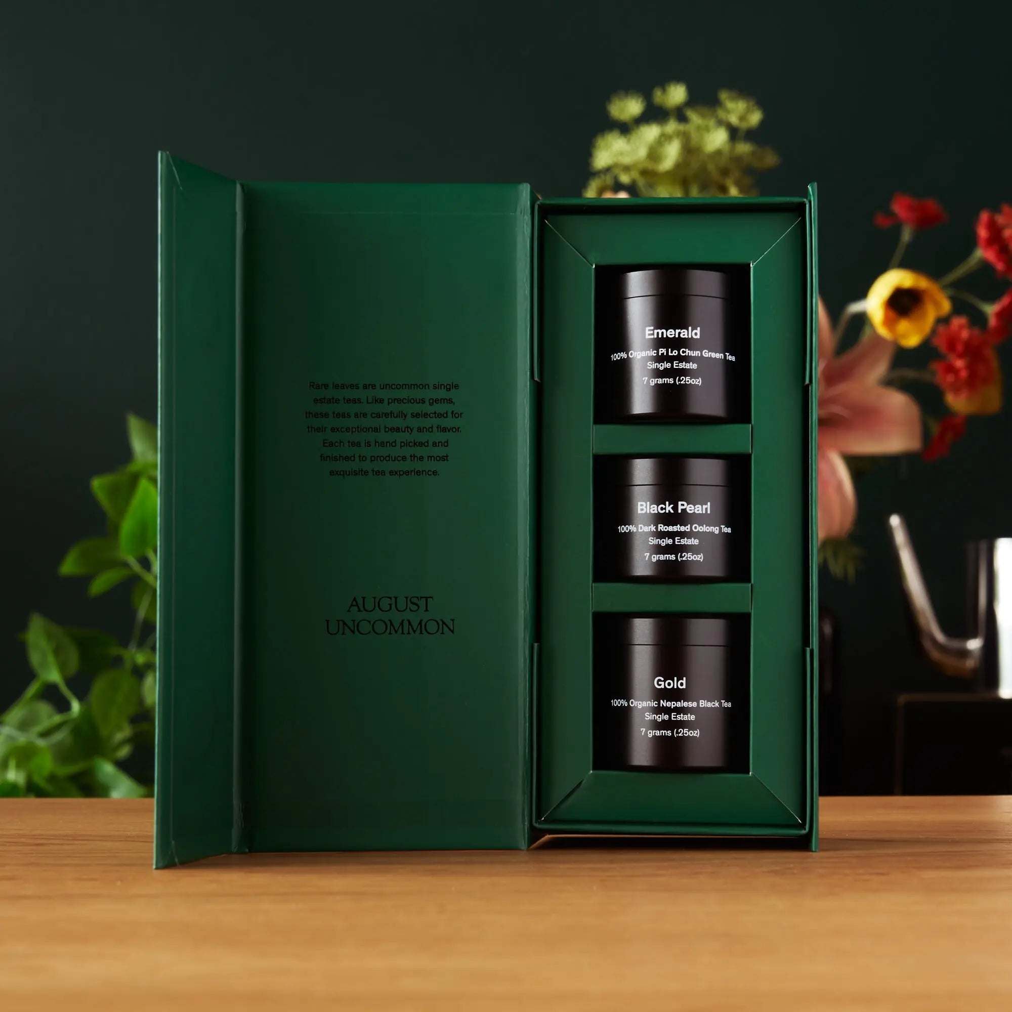 Rare Leaves Single Origin Tea Mini Tin Sample, green presentation box with three black tea tins labeled Emerald, Black Pearl and Gold
