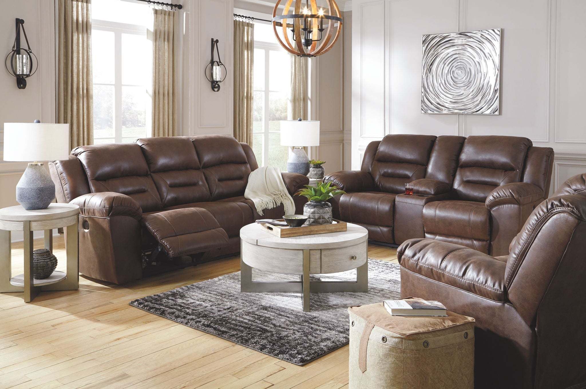 Reclining Living Room Set featuring three-piece brown faux leather sofa set with padded cushions and reclining seats in a modern living room