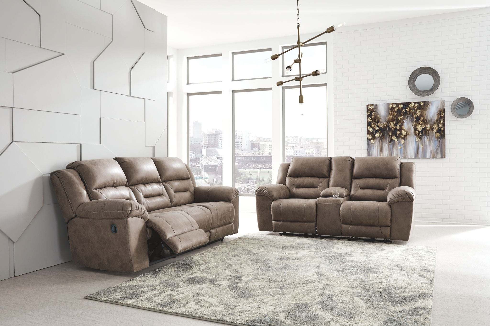 Reclining Living Room Set with brown padded faux leather upholstery, channel-stitched back cushions, and plush armrests for comfort and style.