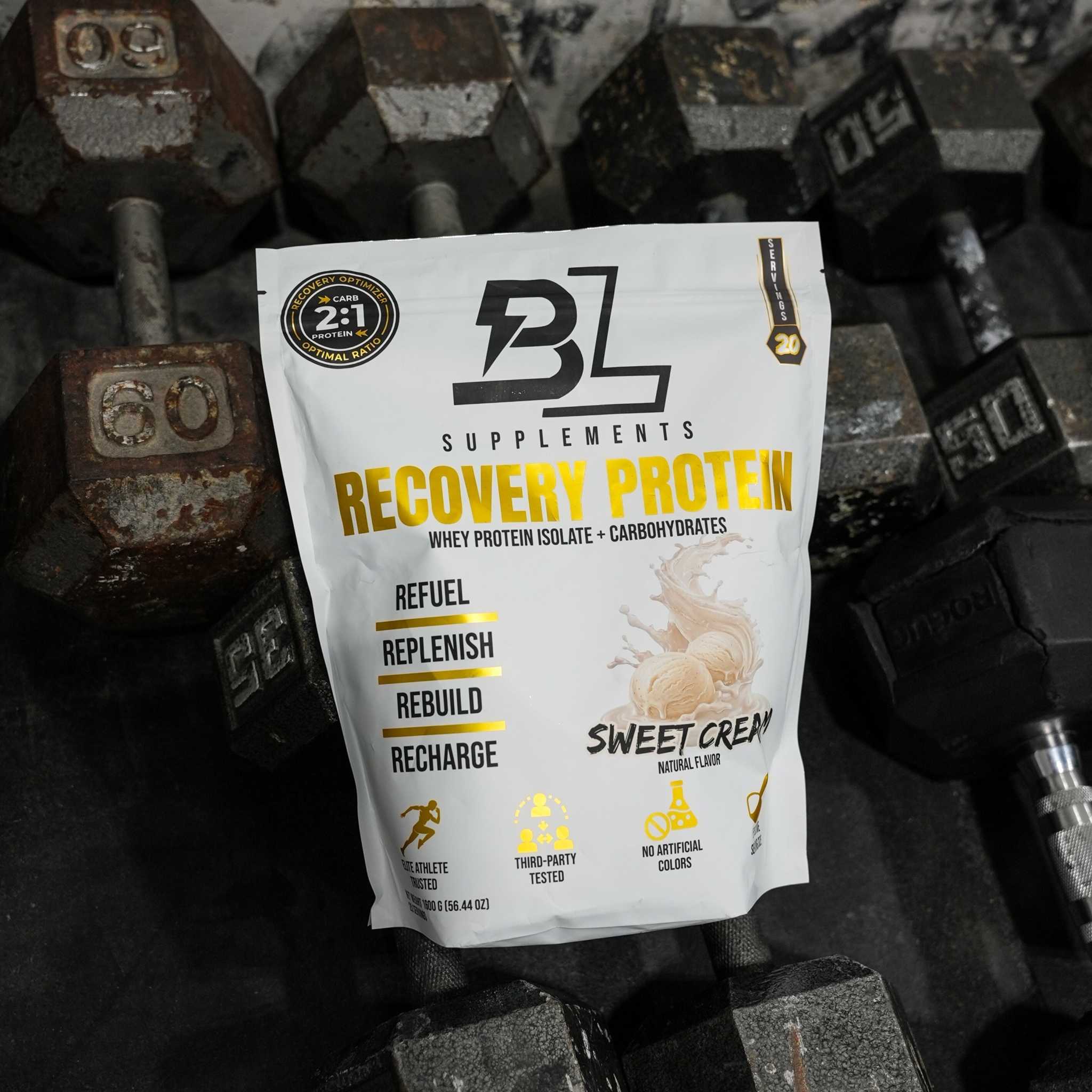 RECOVERY PROTEIN supplement pouch in white with bold yellow lettering, sweet cream flavor label and black branding