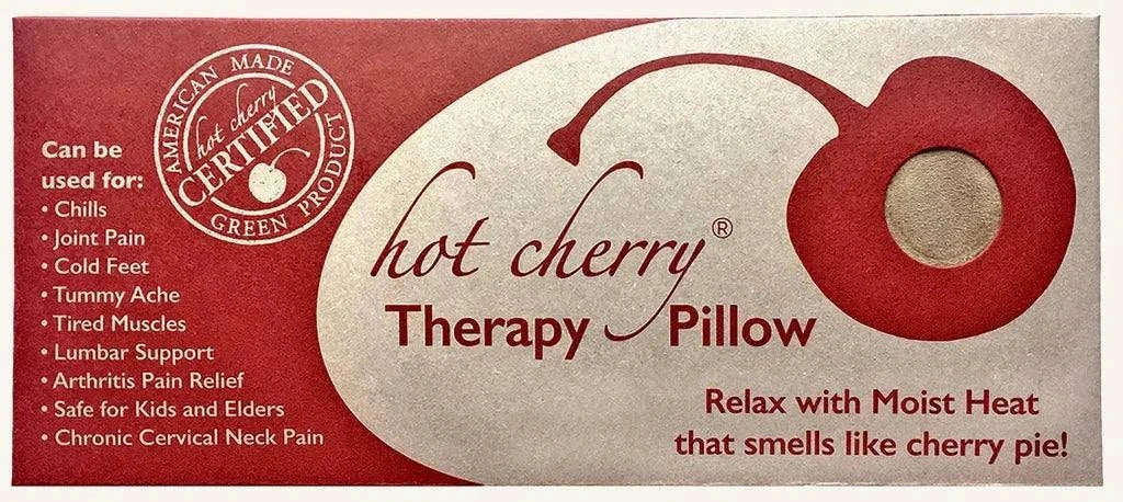 Rectangle/Cervical Pillow product packaging in red and cream, featuring a cherry graphic and Hot Cherry Therapy Pillow branding