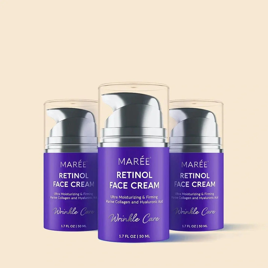 Retinol Lifting & Firming face cream in three purple bottles with silver pumps and clear caps