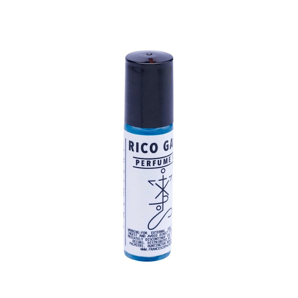 Rico Galan - Earthy Blend perfume in a white cylindrical roll-on bottle with blue accents and a dark cap
