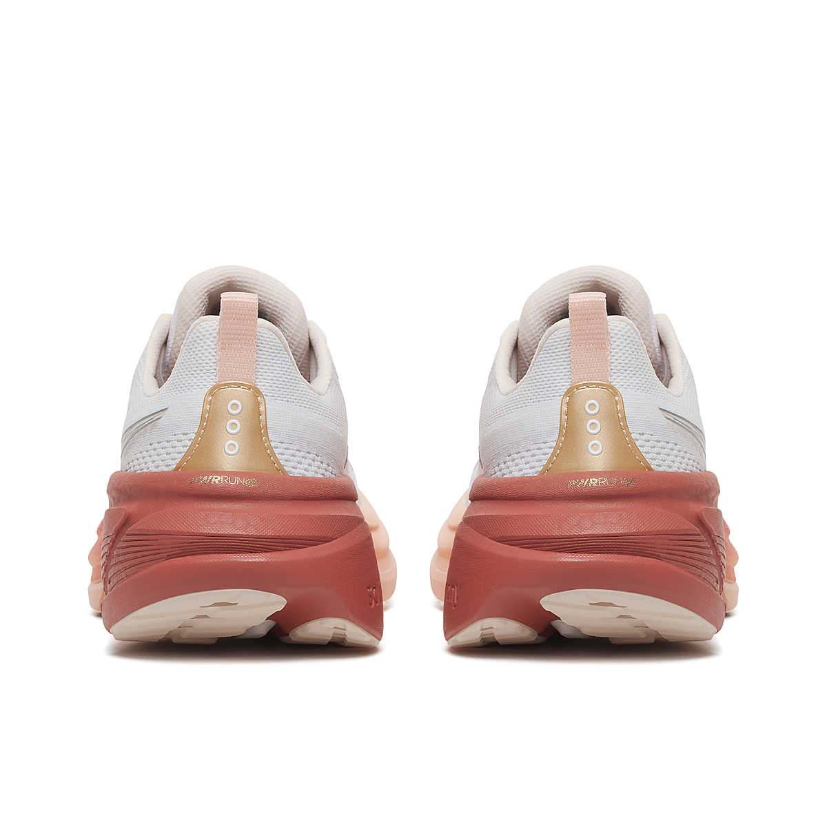 Saucony Women's Hurricane 25 running shoes with white mesh uppers, peach accents and chunky coral-red cushioned heels